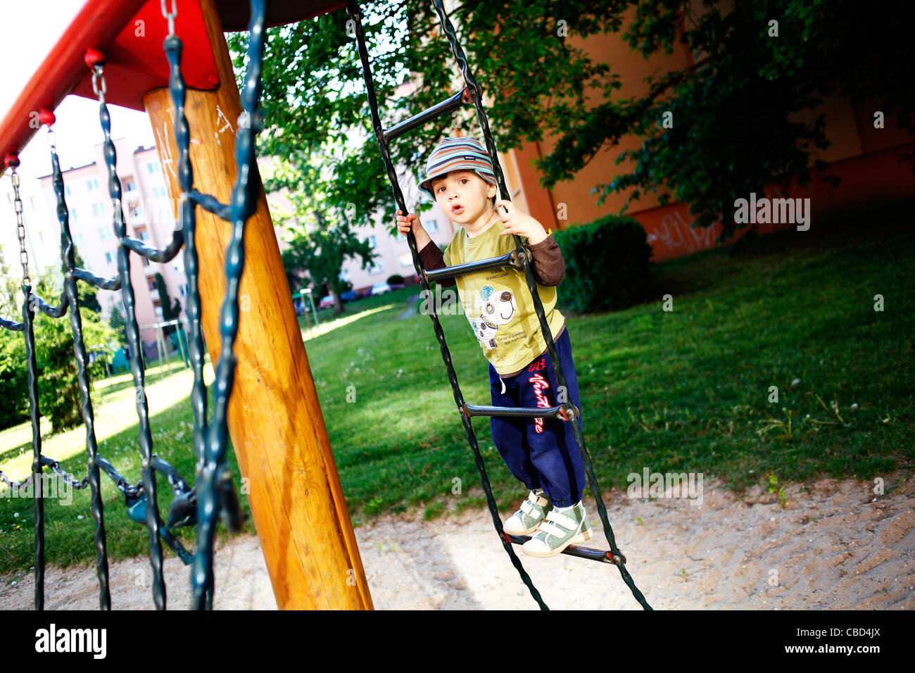 A boy is hanging on a rope ladder. (CTK Photobank / Josef Horazny) Model released, MR Stock Photo