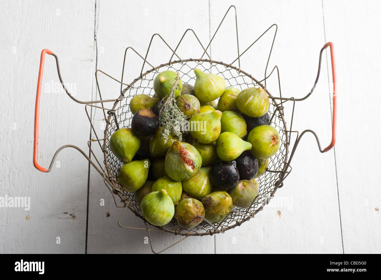 Fresh figs in basket Stock Photo Alamy