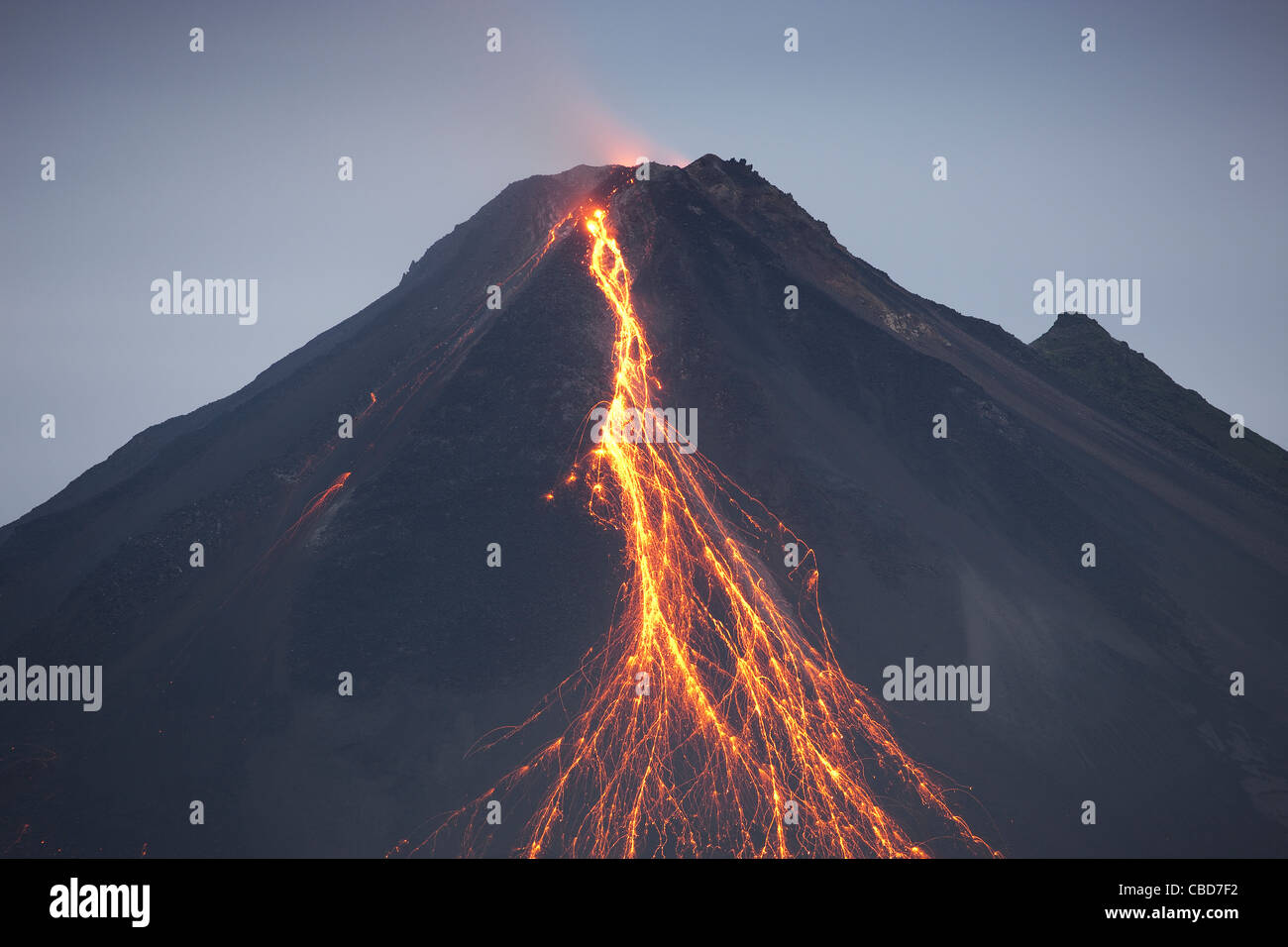 Lava pouring out of volcano Stock Photo Alamy