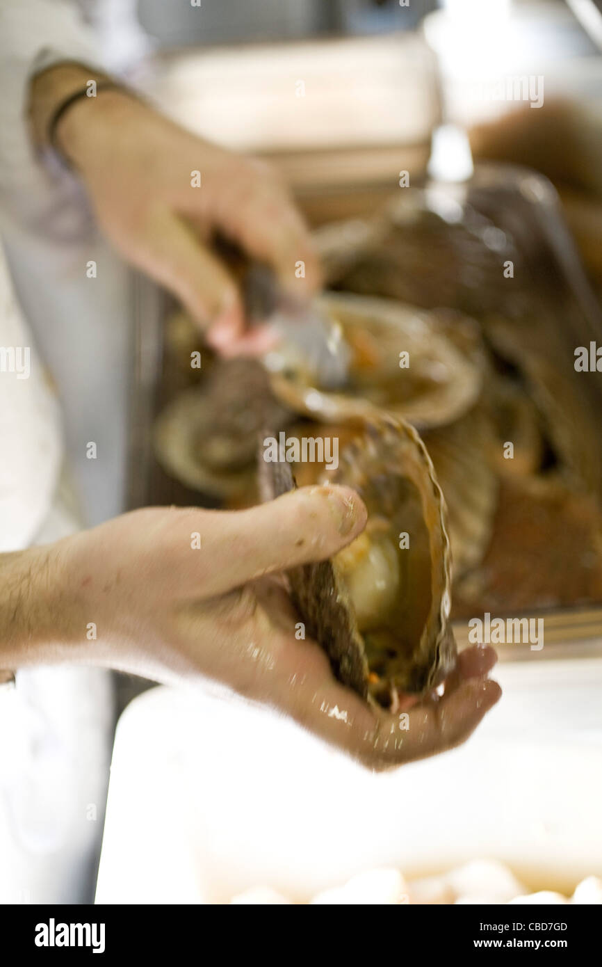 Preparing fresh scallops Stock Photo