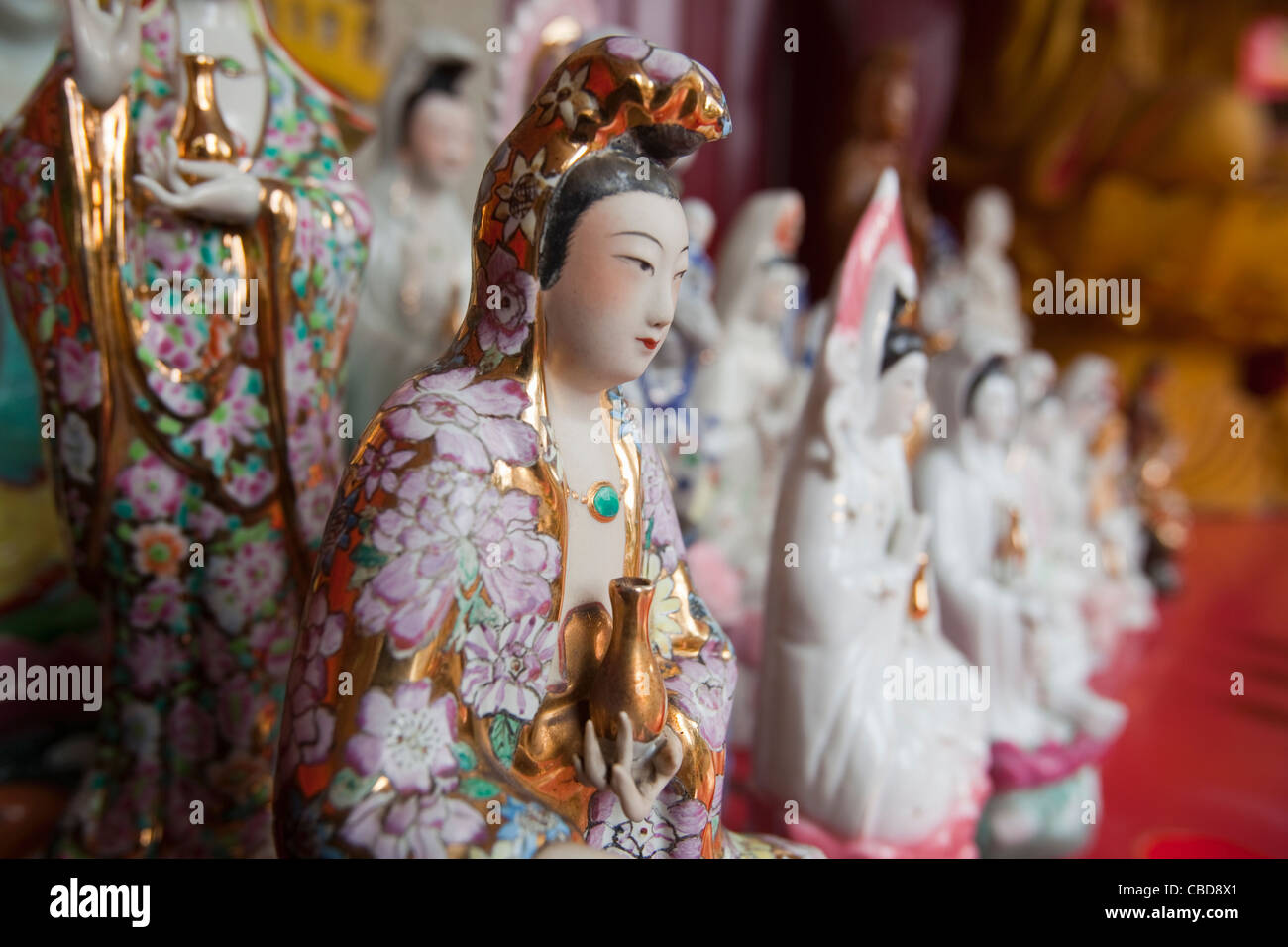 Colorful statues in Chinese shop, Hong Kong, China Stock Photo