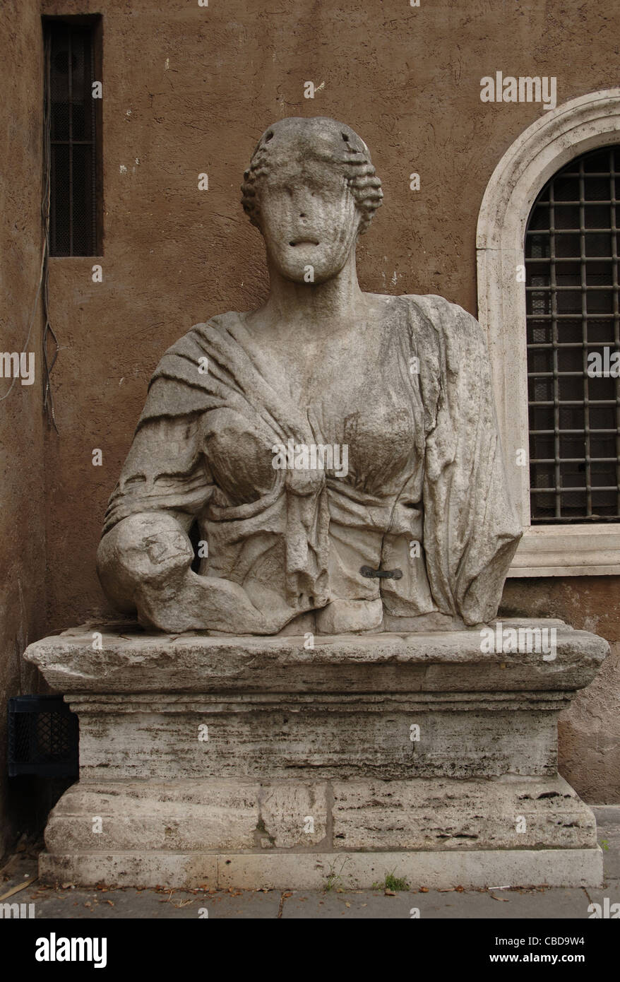 Madama Lucrezia. Roman colossal bust, possible representation of the Goddess Isis. Saint Mark Square. Rome. Italy. Stock Photo