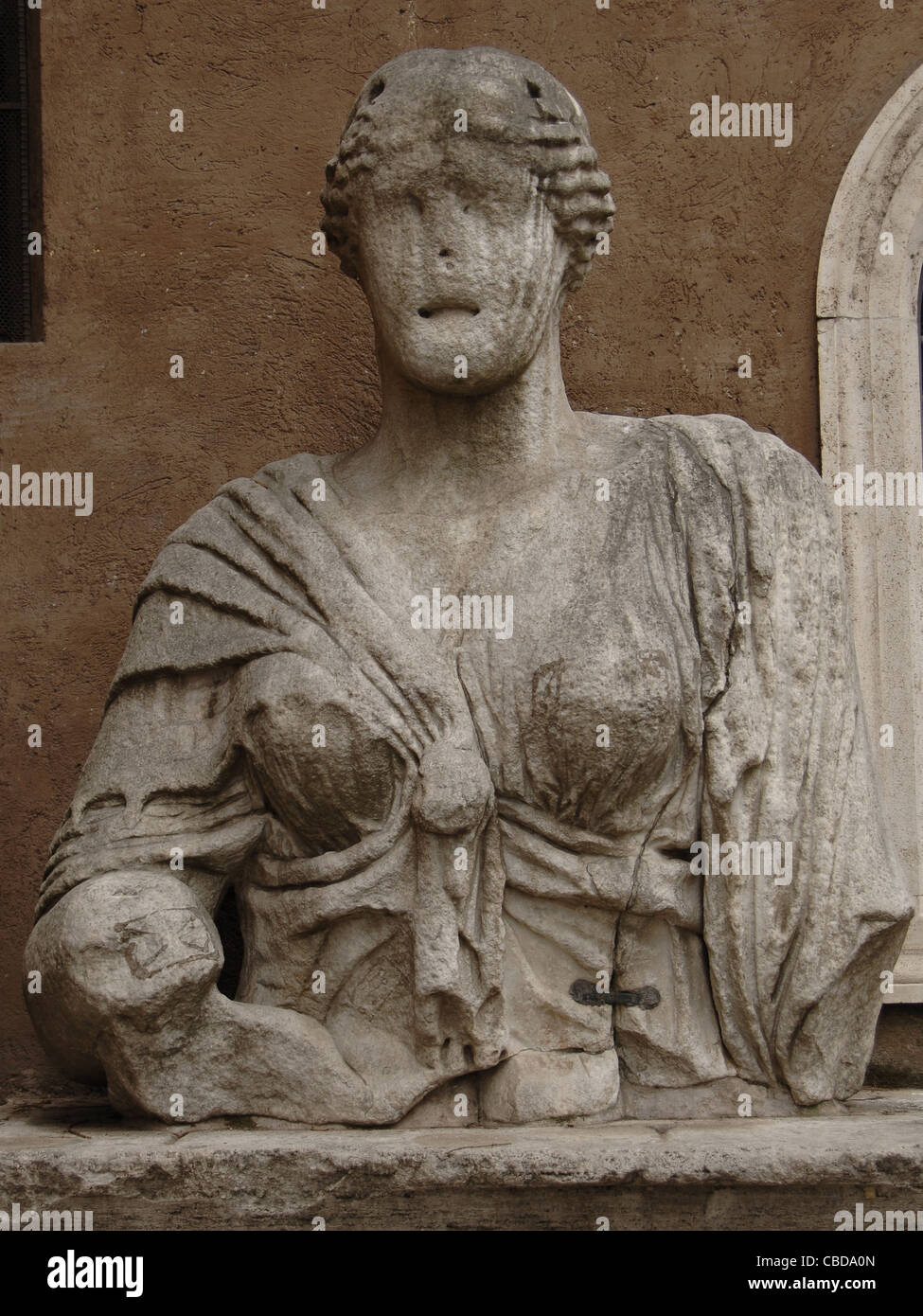 Madama Lucrezia. Roman colossal bust, possible representation of the Goddess Isis. Saint Mark Square. Rome. Italy. Stock Photo