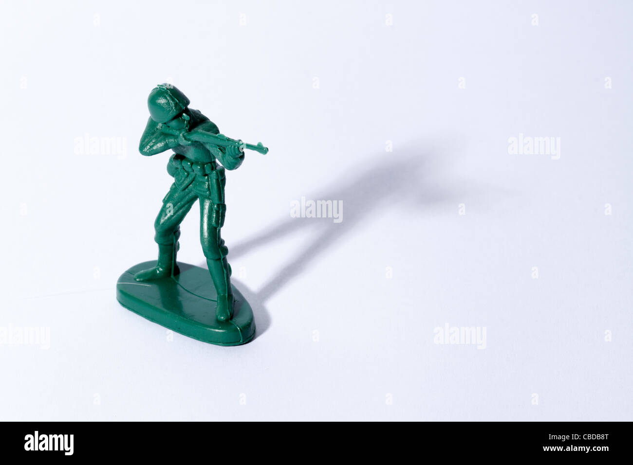 Plastic Toy Soldiers, Army figures fighting on a white background Stock Photo