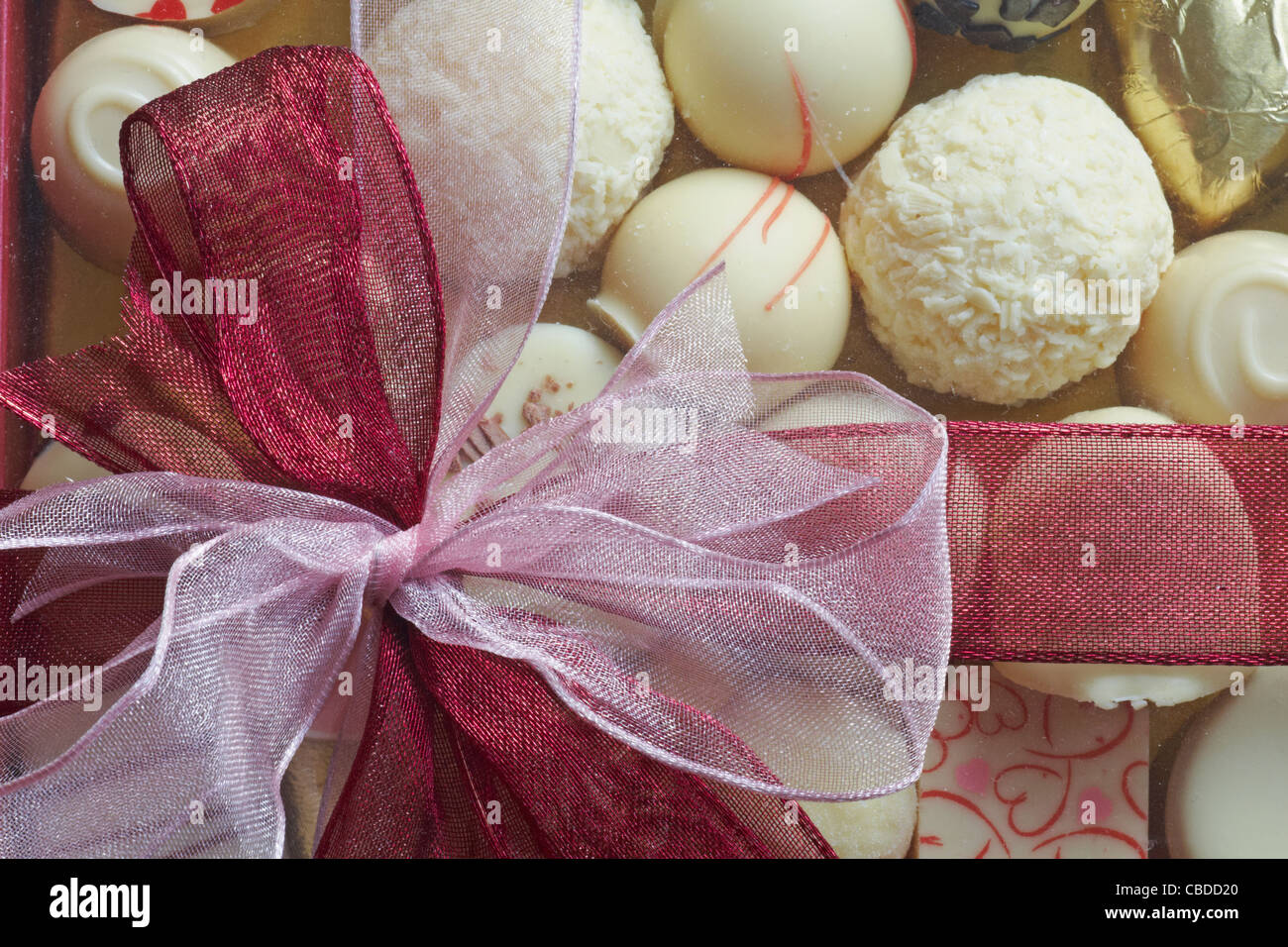 Chocolates tied with ribbon hi-res stock photography and images - Alamy
