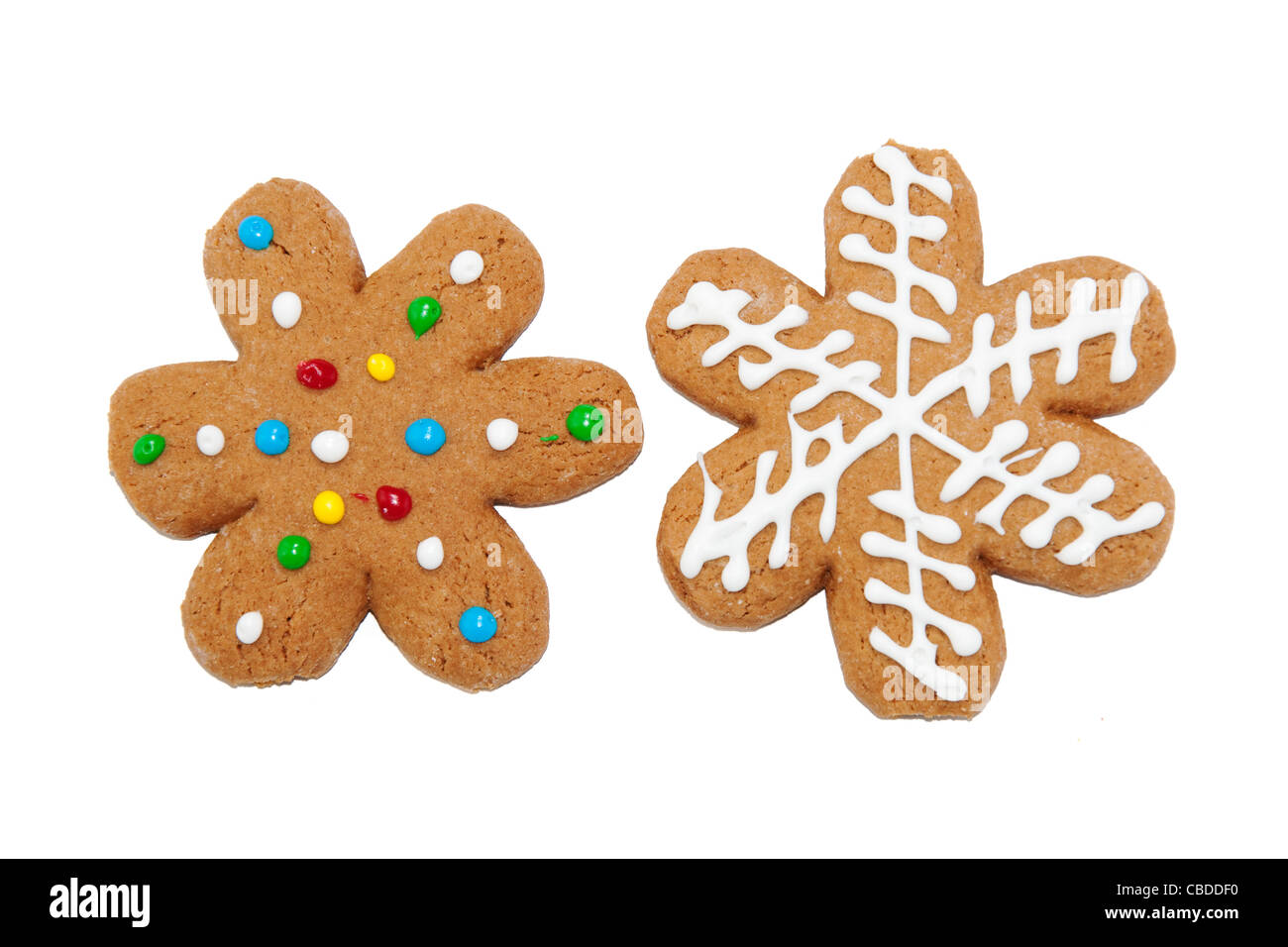 Snowflake shaped gingerbread cookies on white background Stock Photo