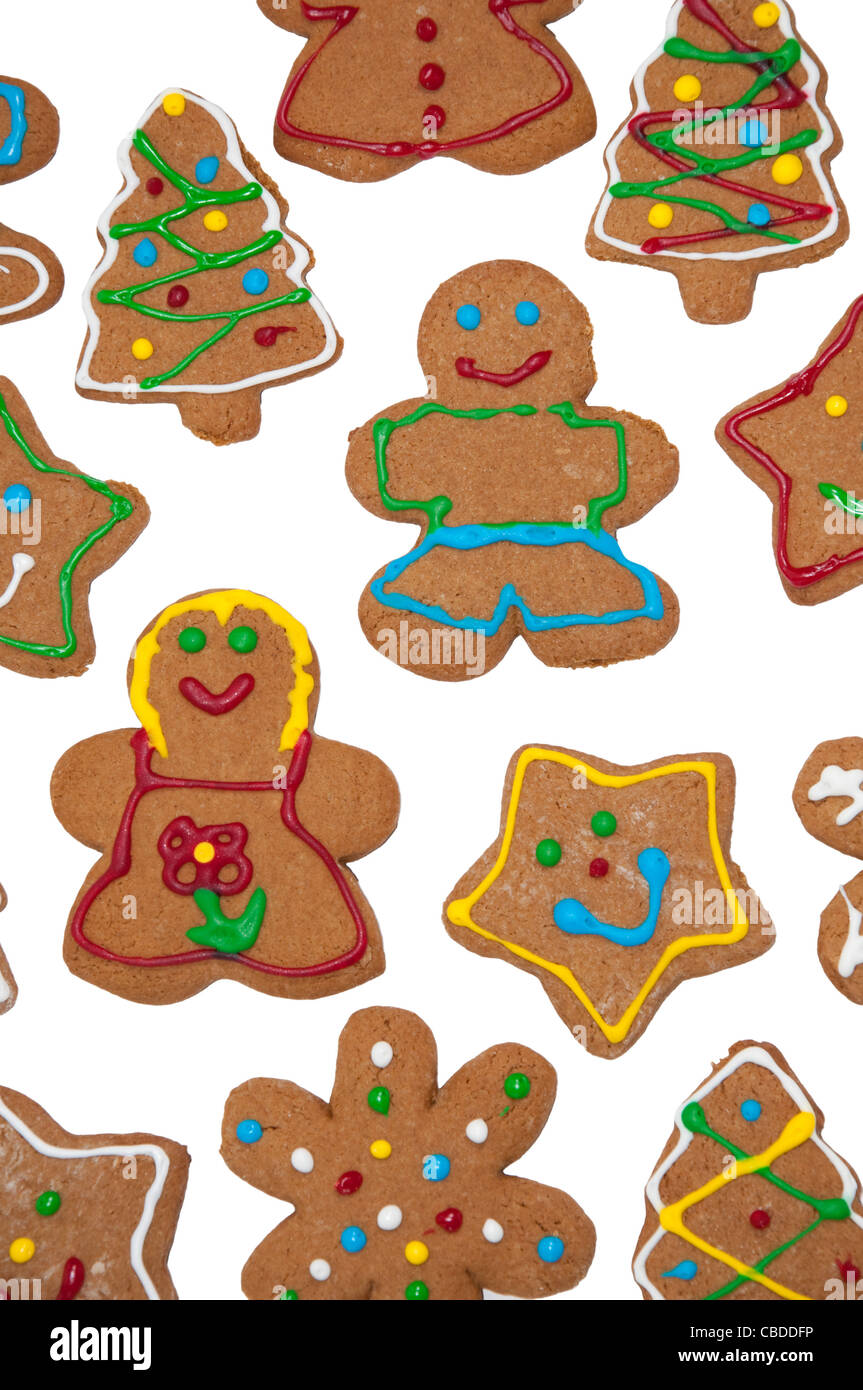 Colorful, glazed gingerbread Christmas cookies on white background Stock Photo