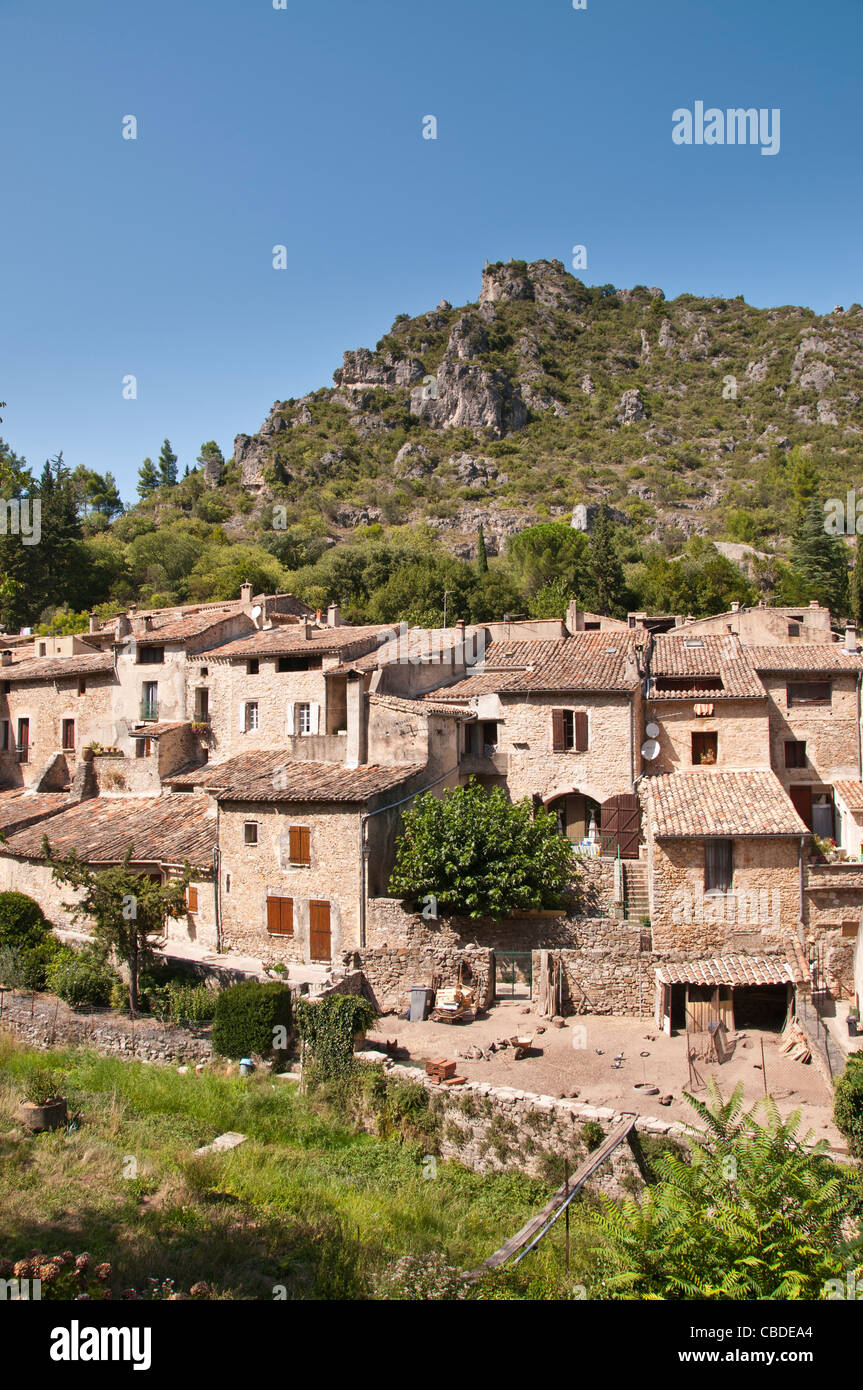 Ancient houses in the hill top village of St Guilhem le Desert Hérault Languedoc-Roussillon France Stock Photo