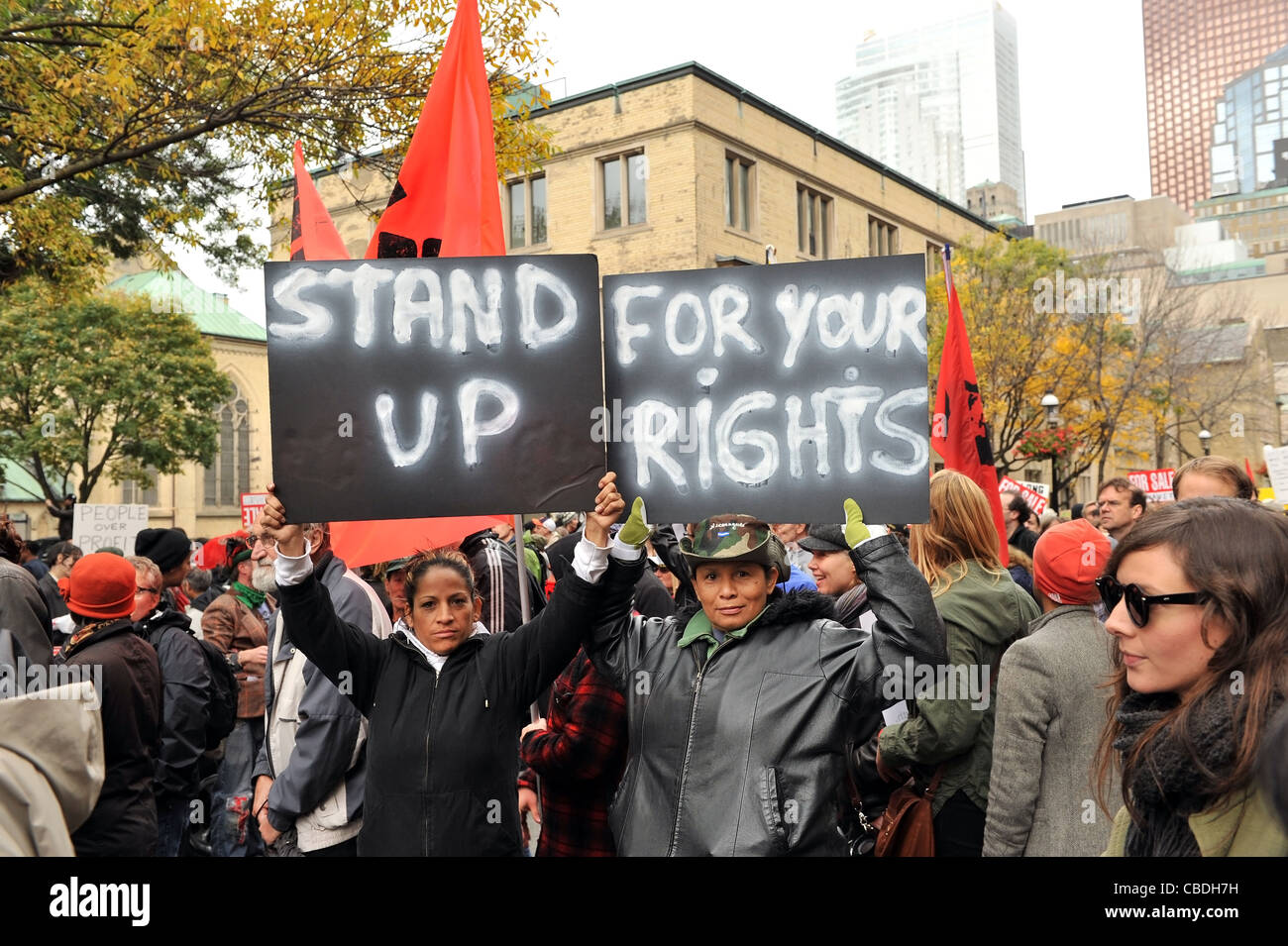 Demonstrators march to Saint James Park in downtown Toronto, Canada for the Toronto version of Occupy Wall Street, Oct. 15 2011. Stock Photo