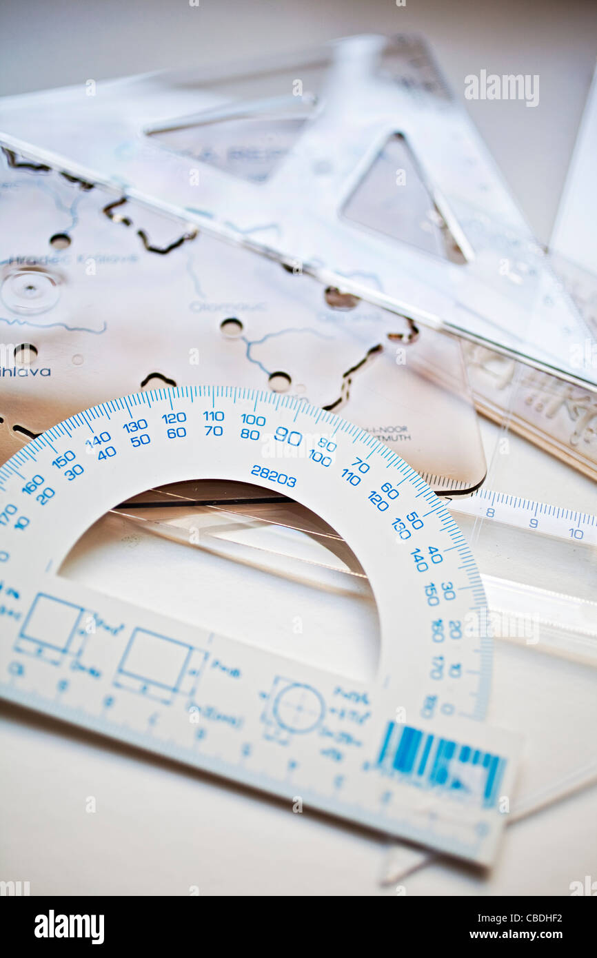 Rule, ruler, triangle, protractor. Drafting implements, geometry. Stock Photo