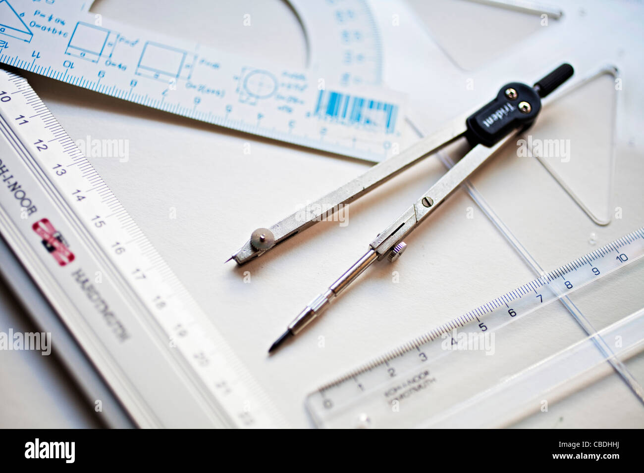 Compass, compasses, rule, ruler, triangle, protractor. Drafting