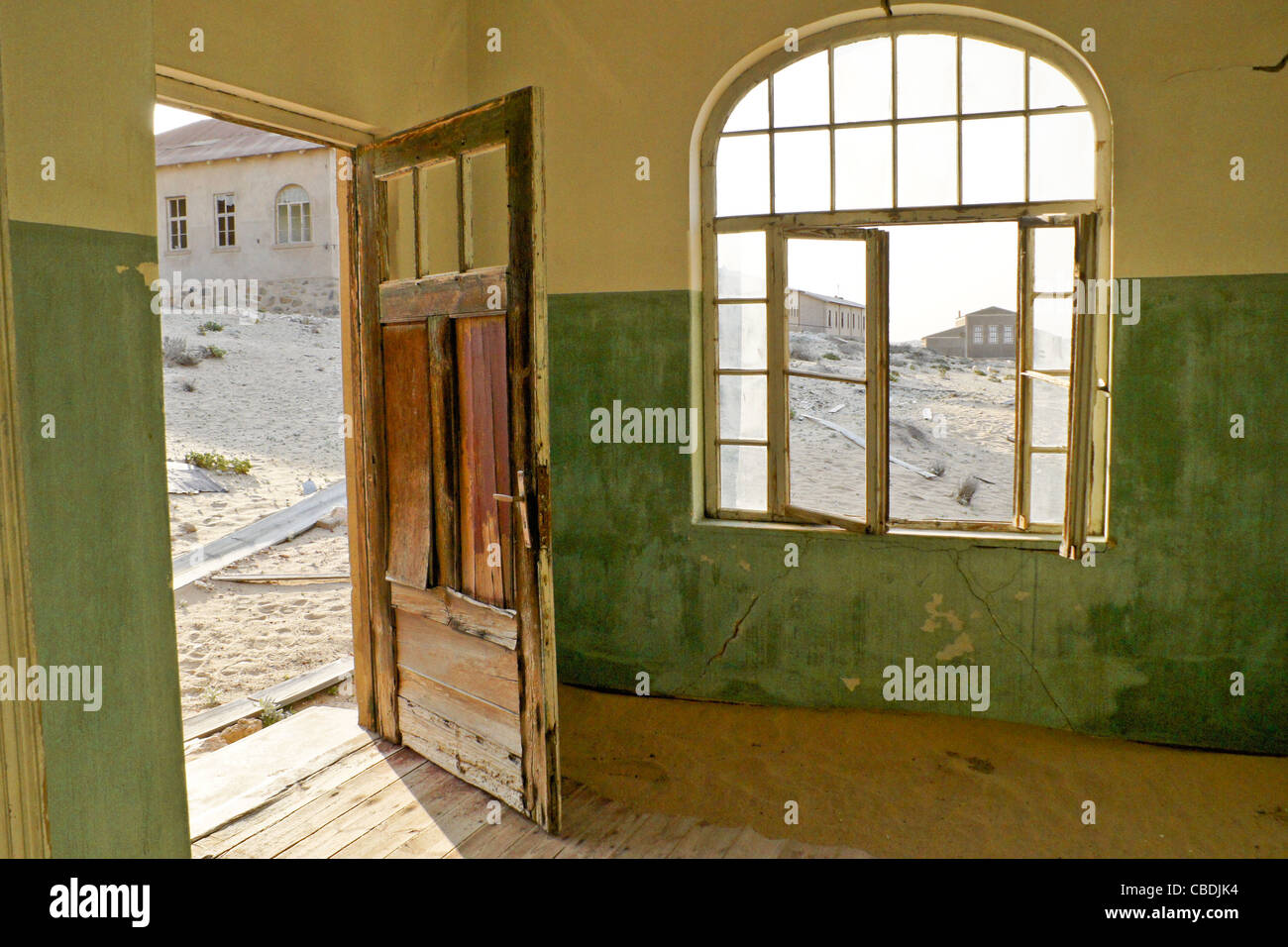 Old building in abandoned diamond mining town of Kolmanskop, Namibia Stock Photo