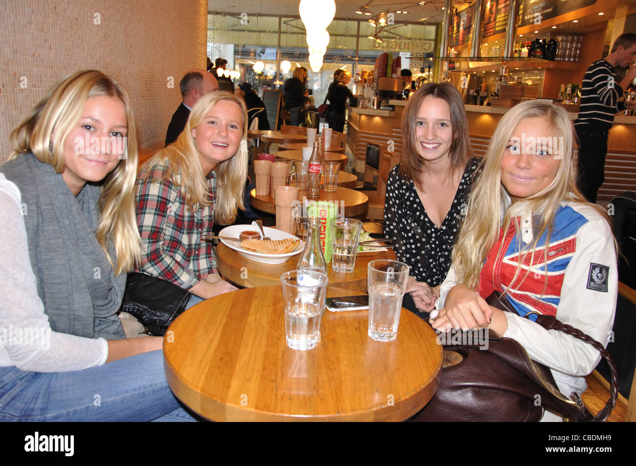 Young Swedish girls in cafe in Kungsportsplatsen, Gothenburg, Västergötland & Bohuslän Province, Kingdom of Sweden Stock Photo