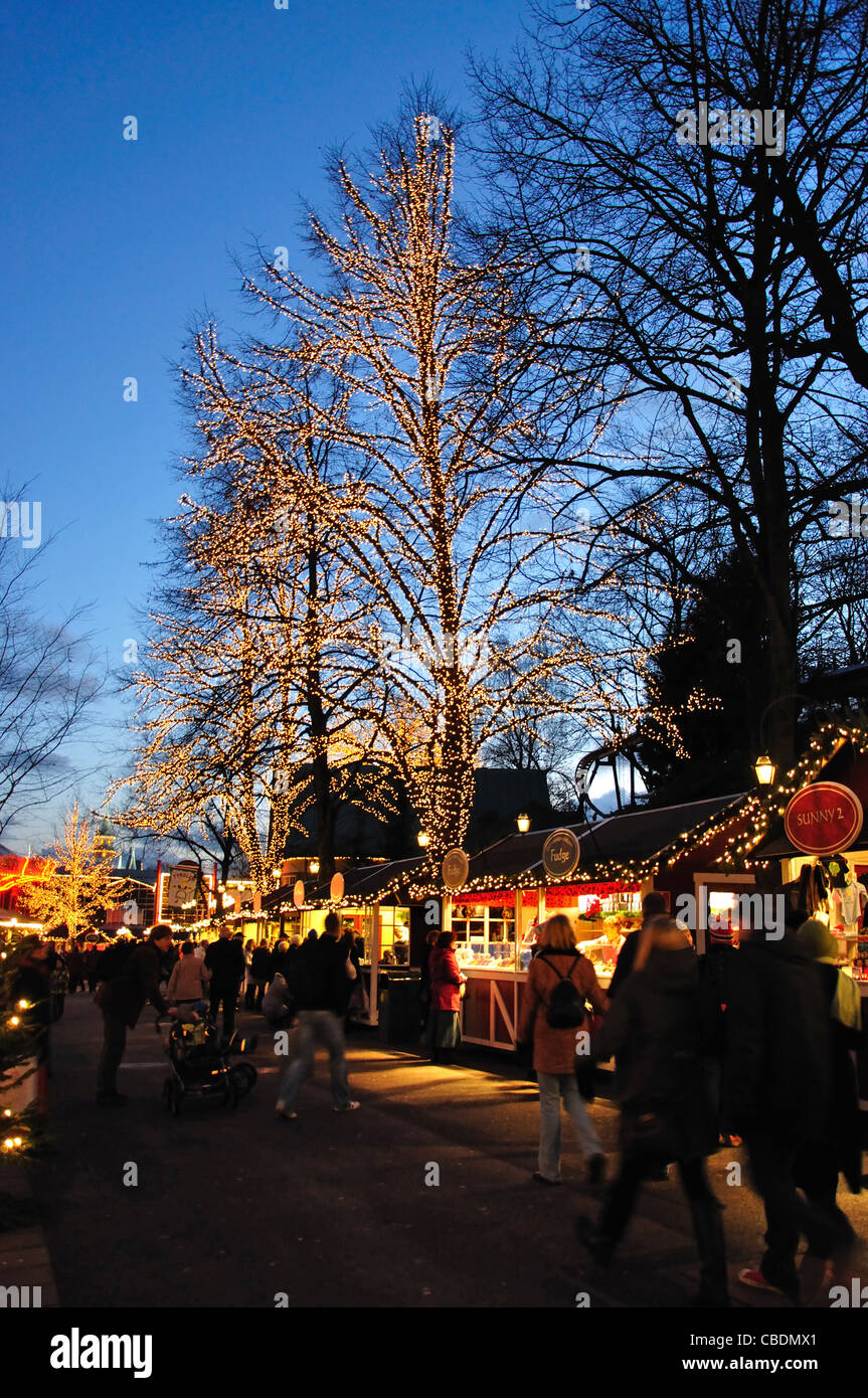 Market stalls and fairy lights at Liseberg Christmas Market, Gothenburg, Västergötland & Bohuslän Province, Kingdom of Sweden Stock Photo