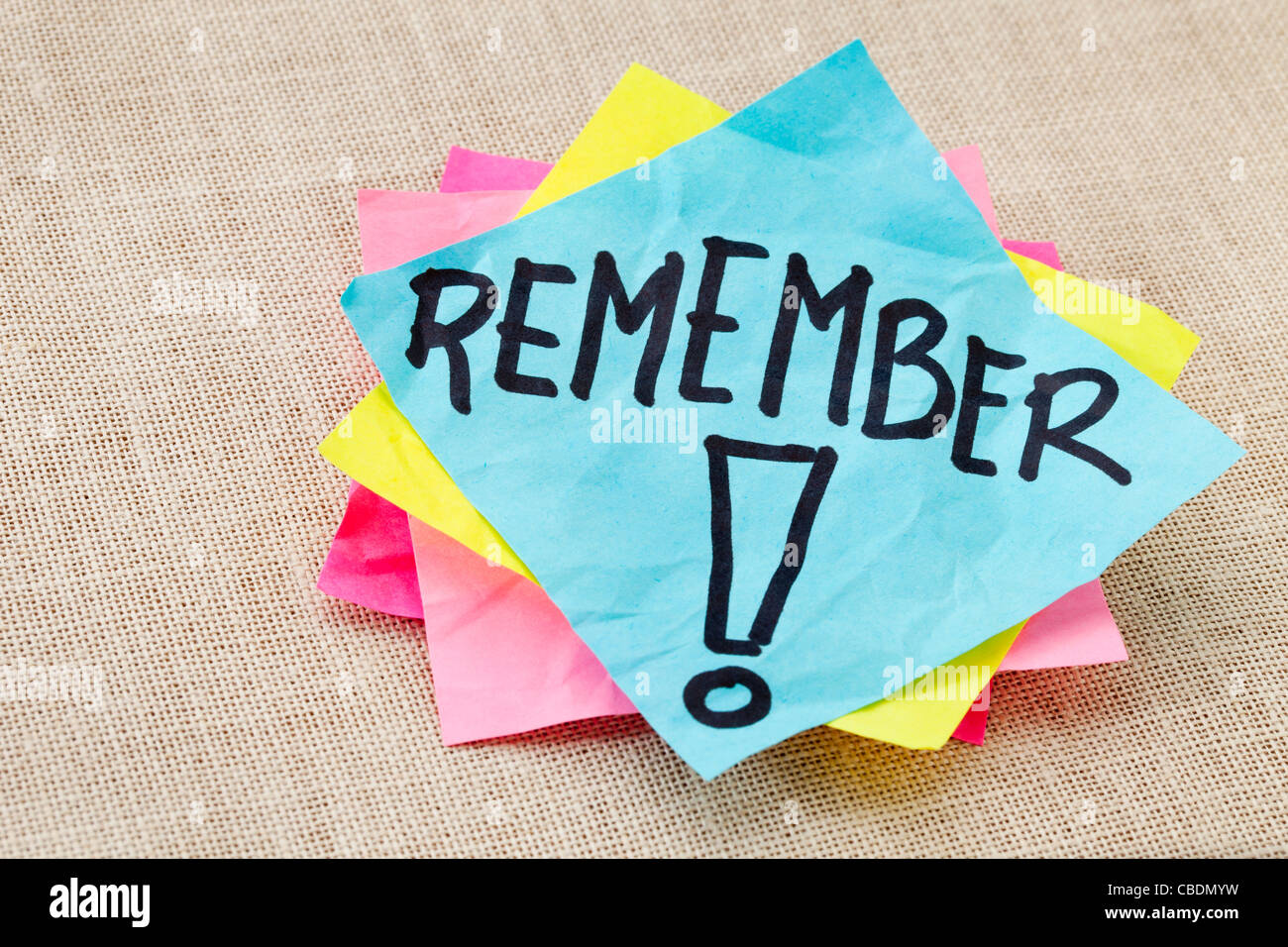 reminder concept - remember word handwritten on blue sticky note Stock Photo