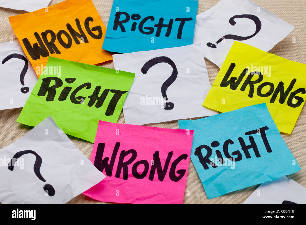 wrong or right dilemma or ethical question - handwriting on colorful sticky notes Stock Photo