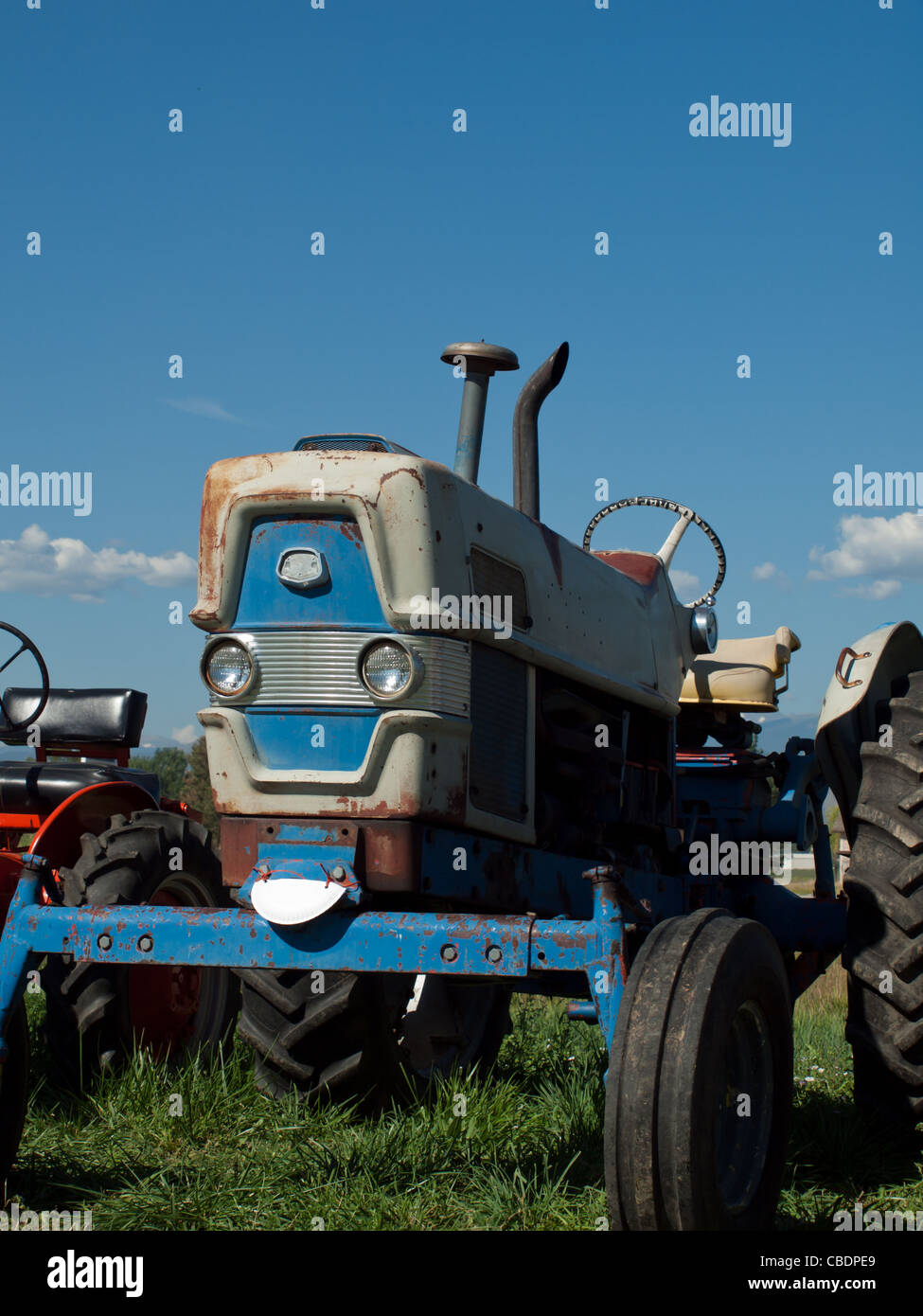 Men harvesting hay with old farm equipment Stock Photo - Alamy