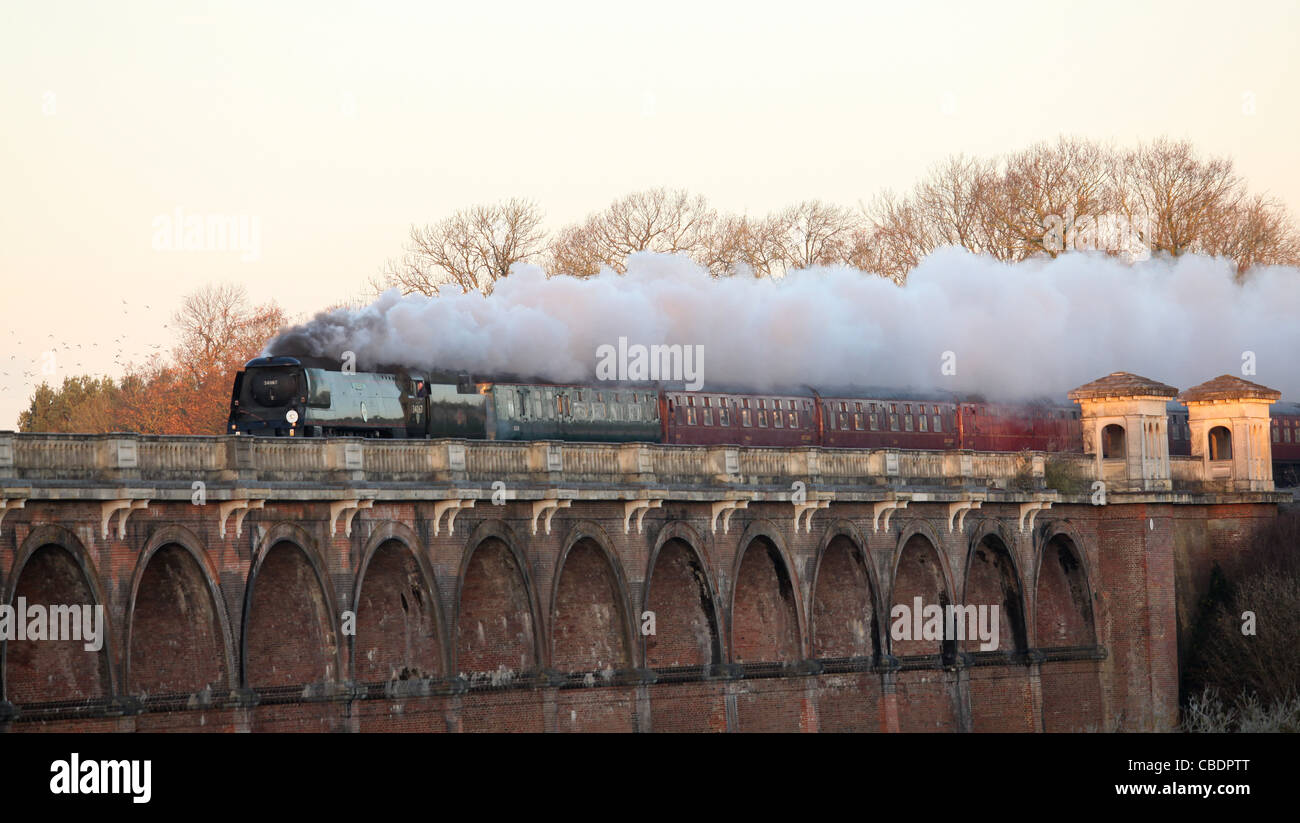 Battle of Britain class No. 34067 Tangmere crosses the Ouse Valley Viaduct. Picture by James Boardman Stock Photo
