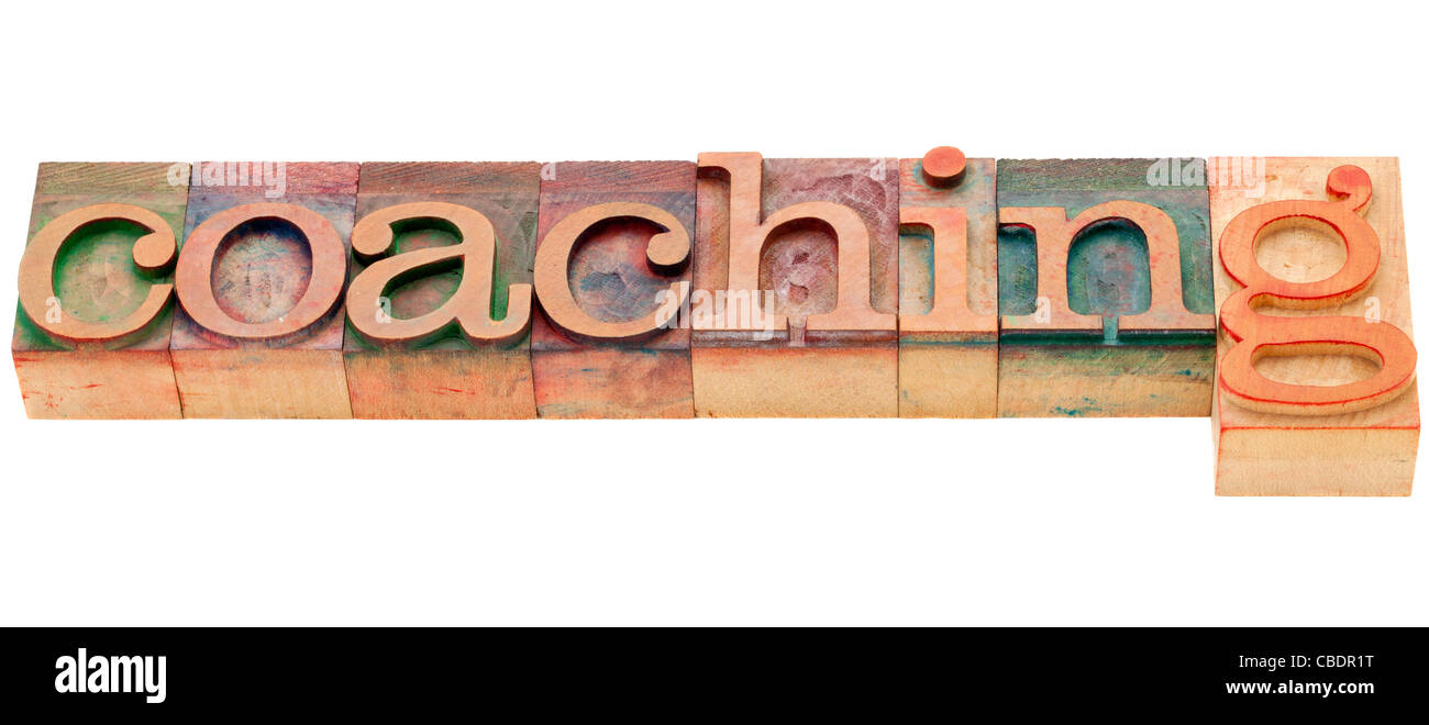 coaching - isolated word in vintage wood letterpress printing blocks ...