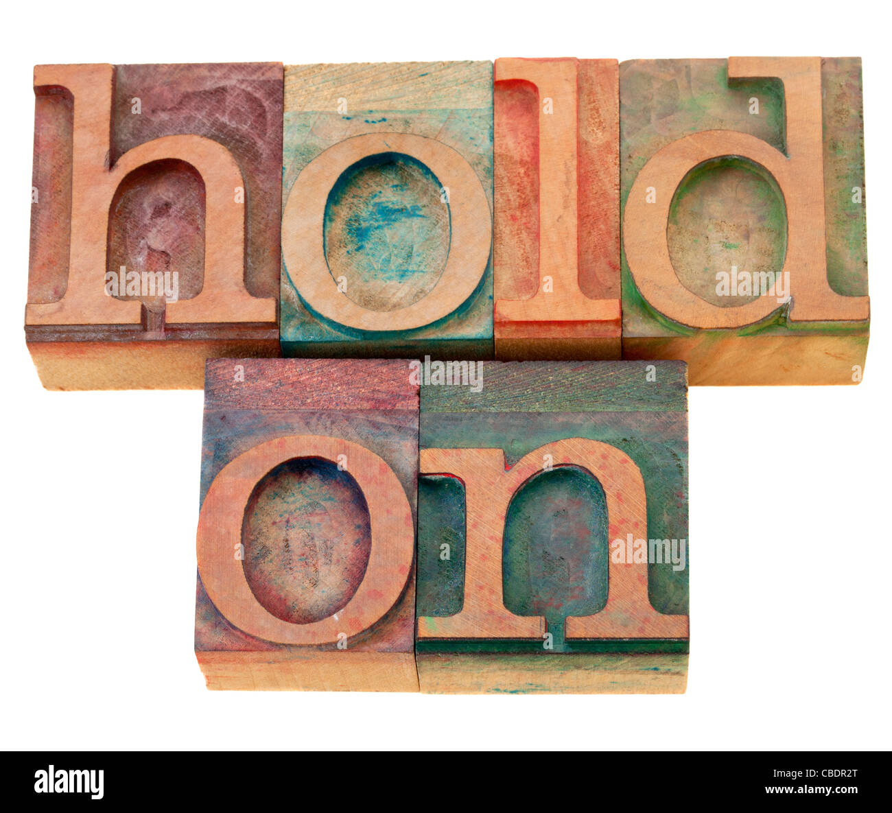 motivational concept - hold on - isolated phrase in vintage wood letterpress type Stock Photo