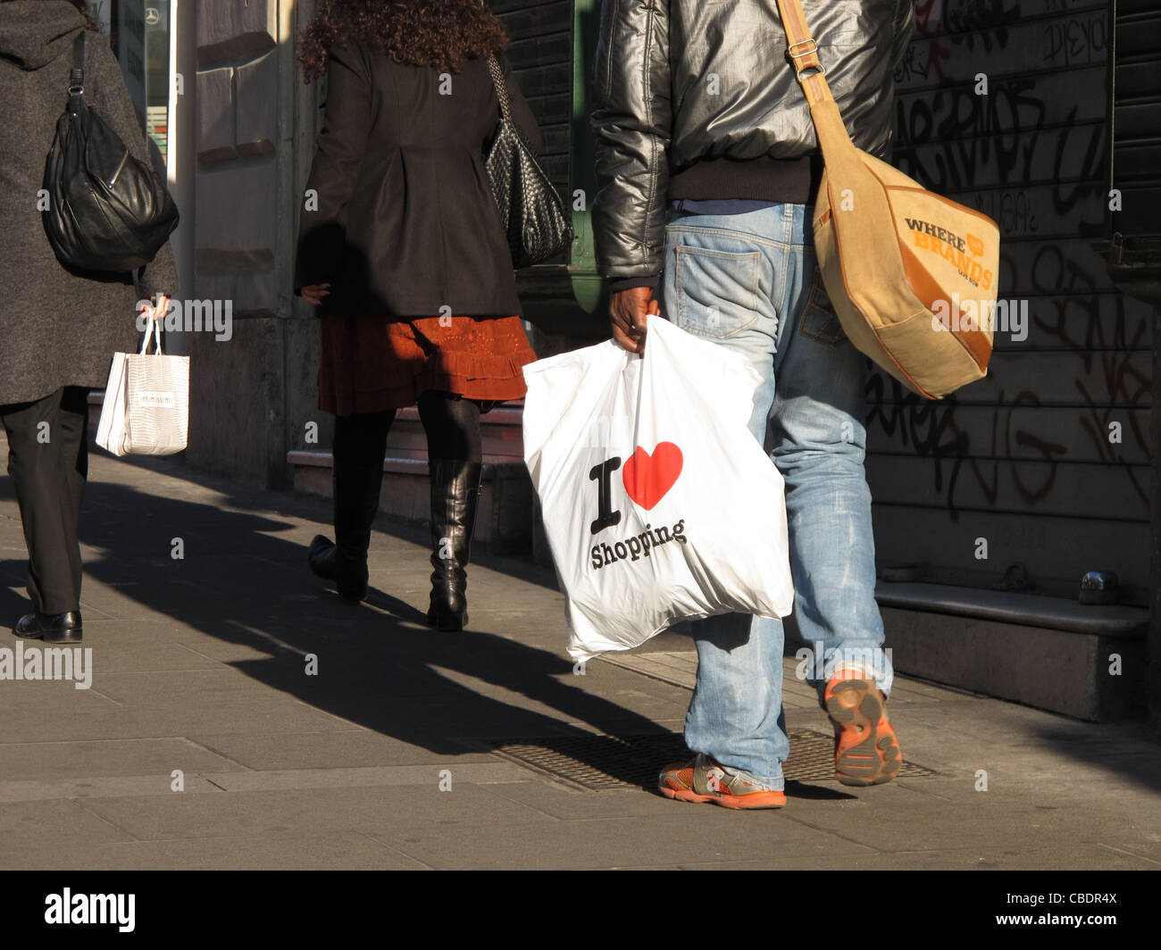 woman with i love shopping bag in street in rome italy Stock Photo