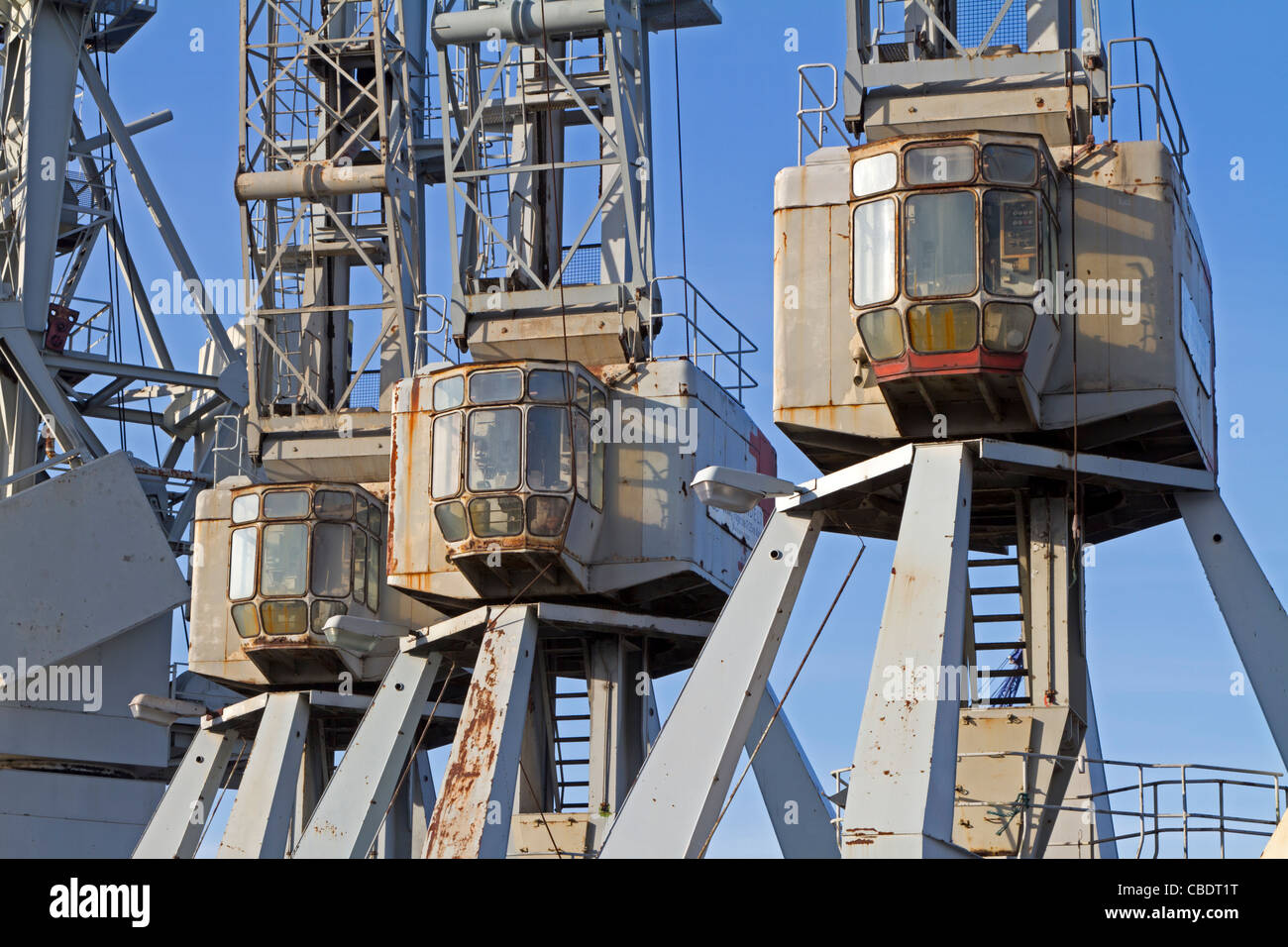 Old loading cranes at Hamburg harbour, Germany Stock Photo