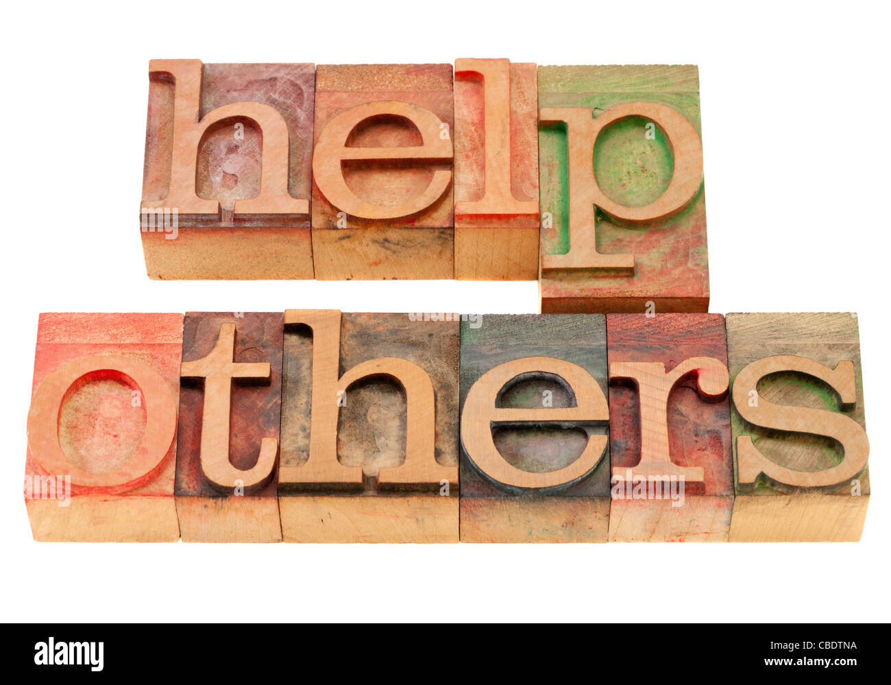 help others motivational reminder - phrase in vintage wood letterpress type, stained by color inks, isolated on white Stock Photo