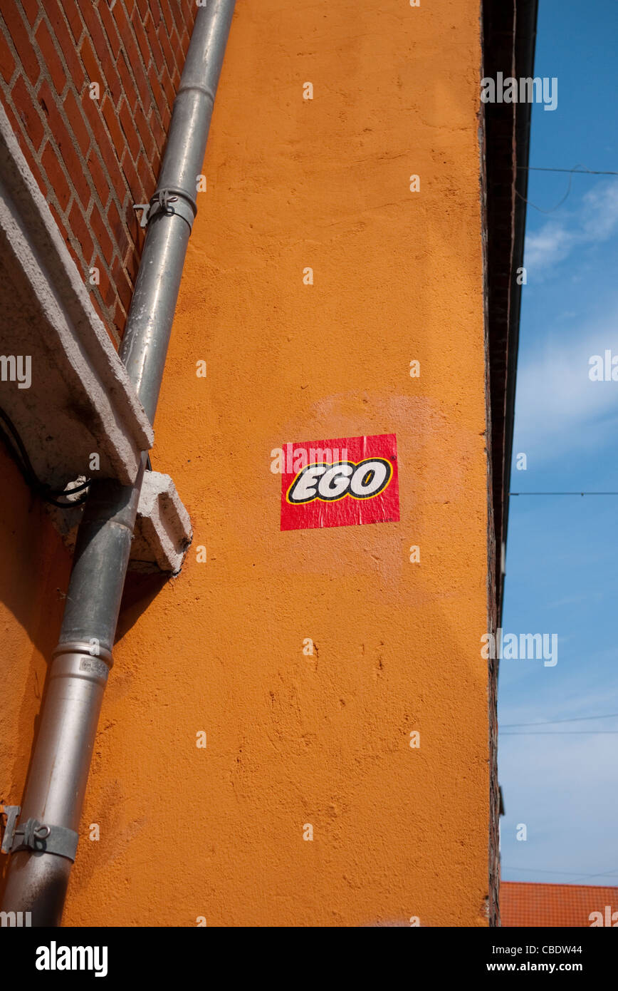 Modyfied lego logo on wall to say Ego Stock Photo