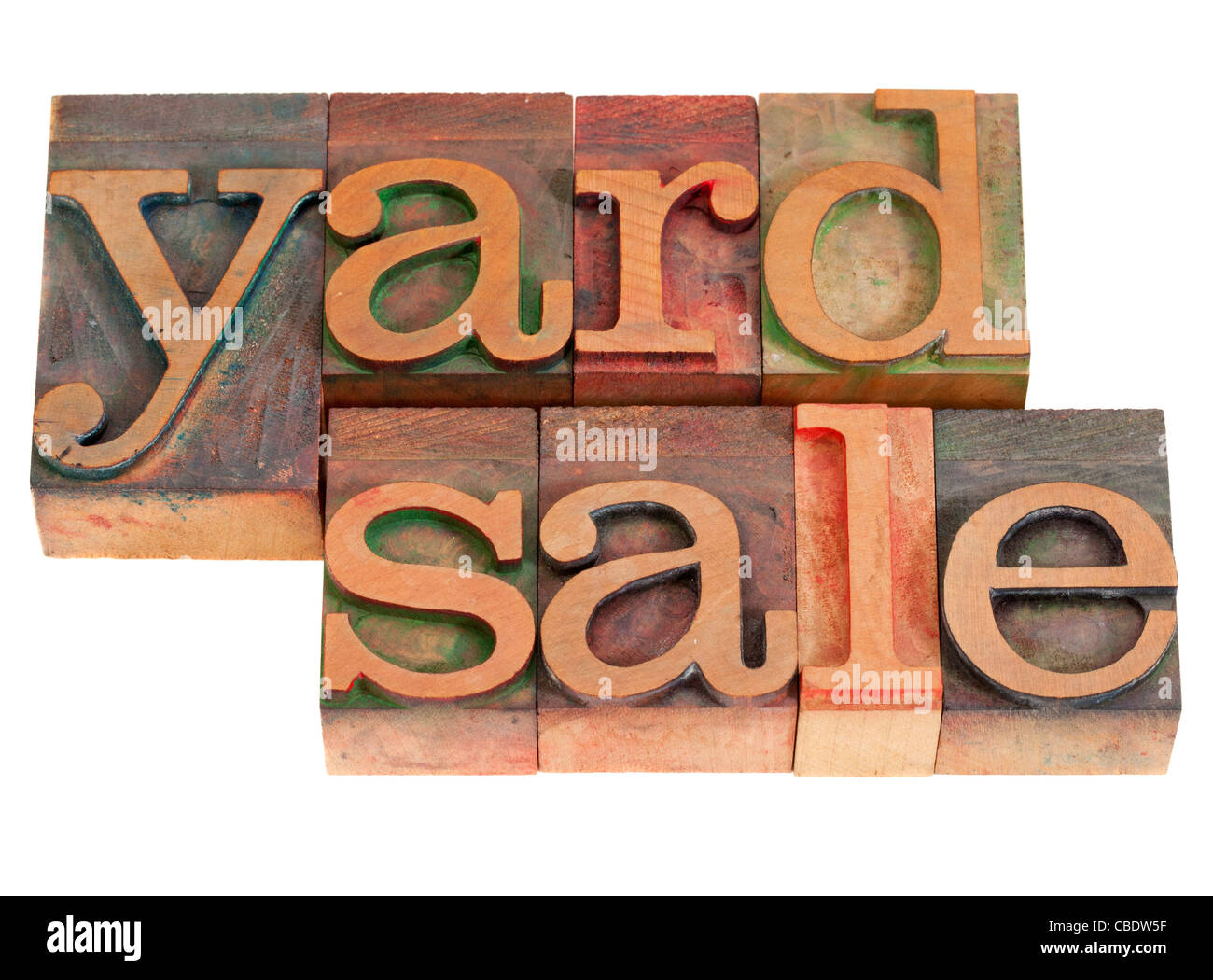 yard sale words in vintage wood letterpress printing blocks, stained by color inks, isolated on white Stock Photo