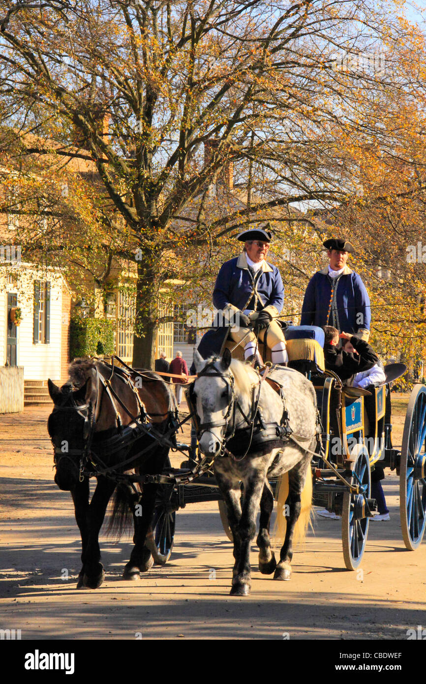 Tourists take carriage ride through the Historic Area in Colonial
