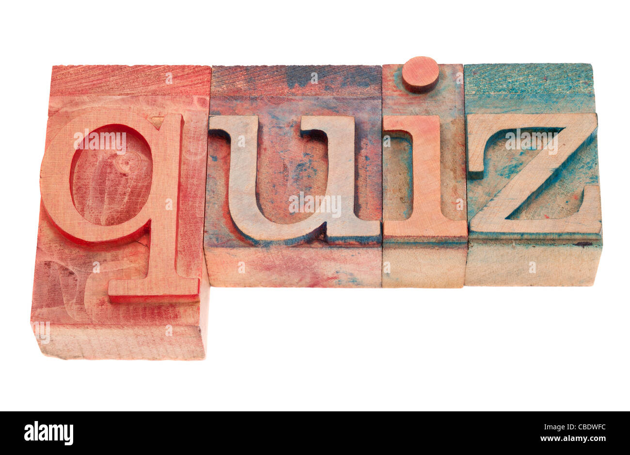 quiz word in vintage wood letterpress printing blocks, stained by color inks, isolated on white Stock Photo