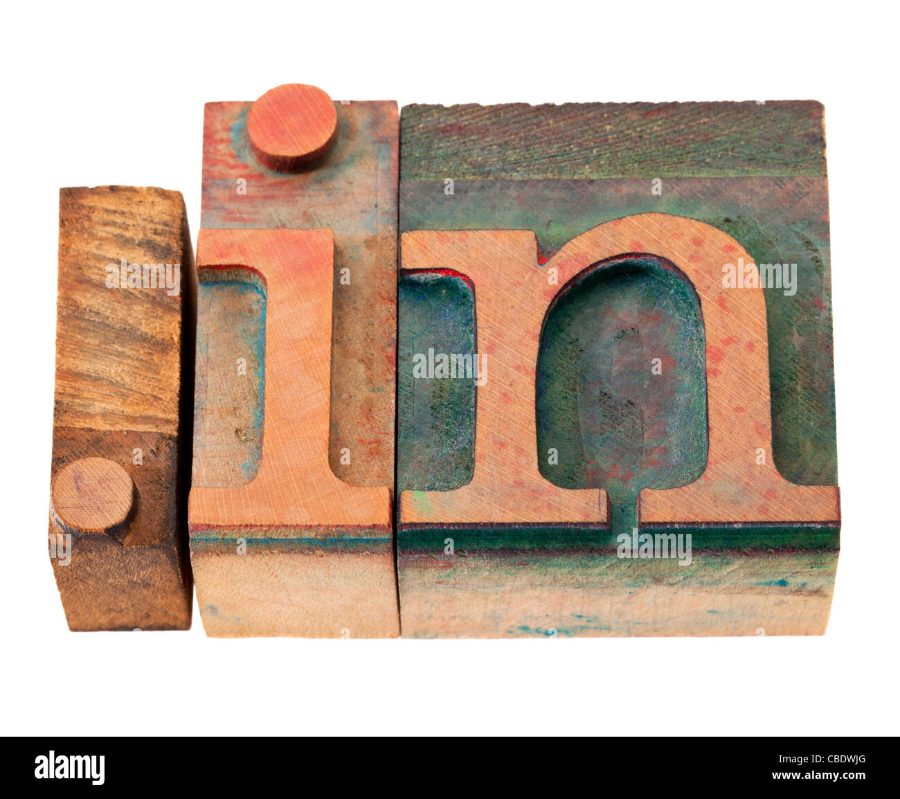 dot in - internet domain for India in vintage wooden letterpress printing blocks, stained by color inks, isolated on white Stock Photo