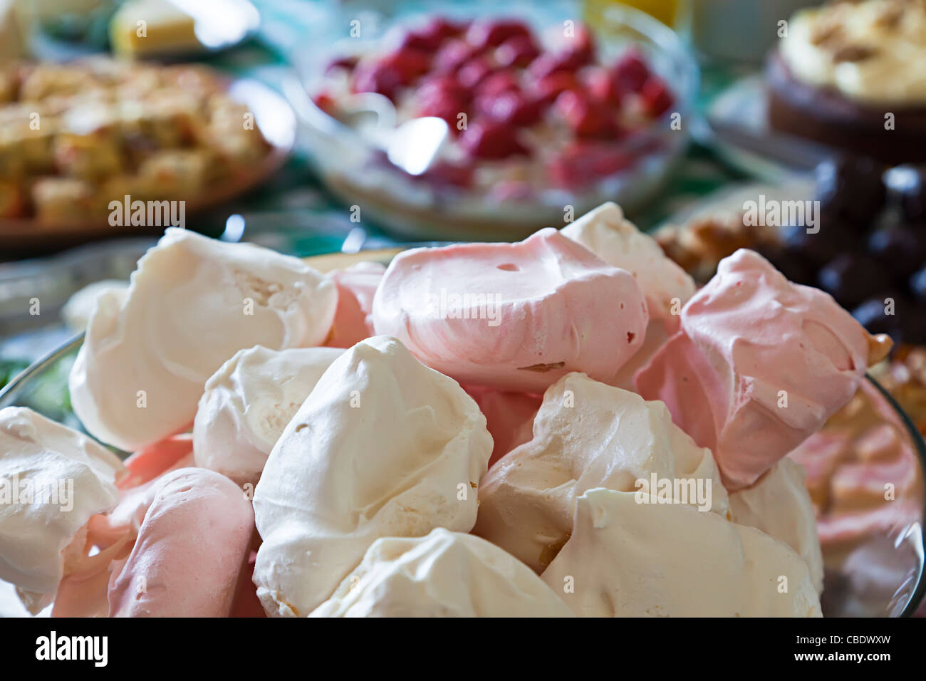 Home made merangue on dessert table UK Stock Photo