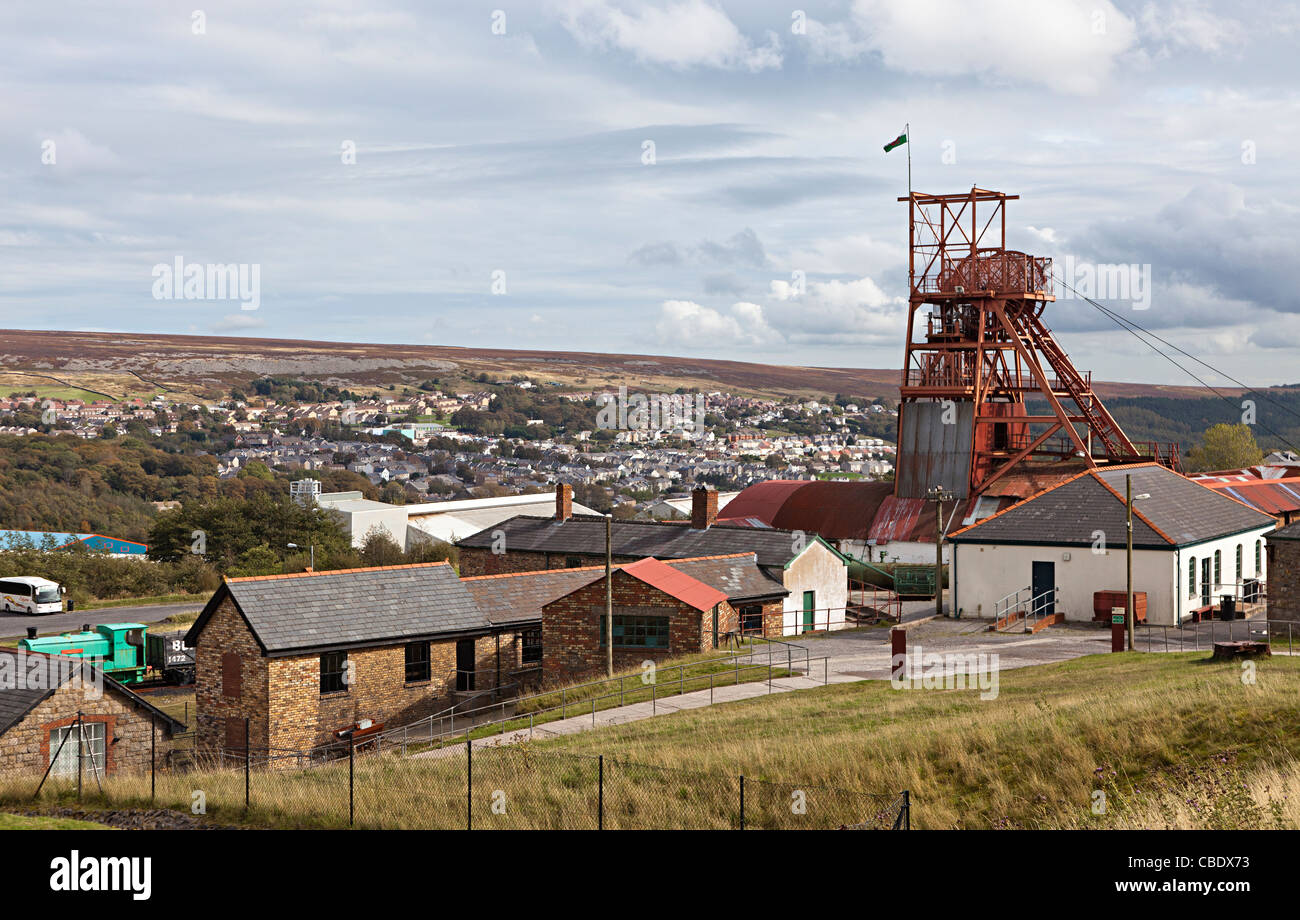 Winding gear and buildings Big Pit coal mine with Blaenavon in distance Wales UK Stock Photo