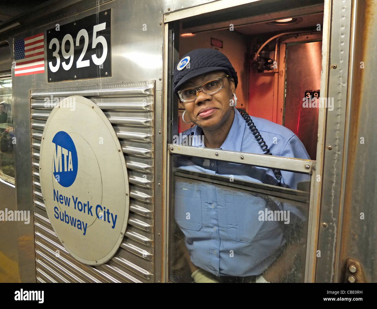 subway conductor in train car Stock Photo Alamy
