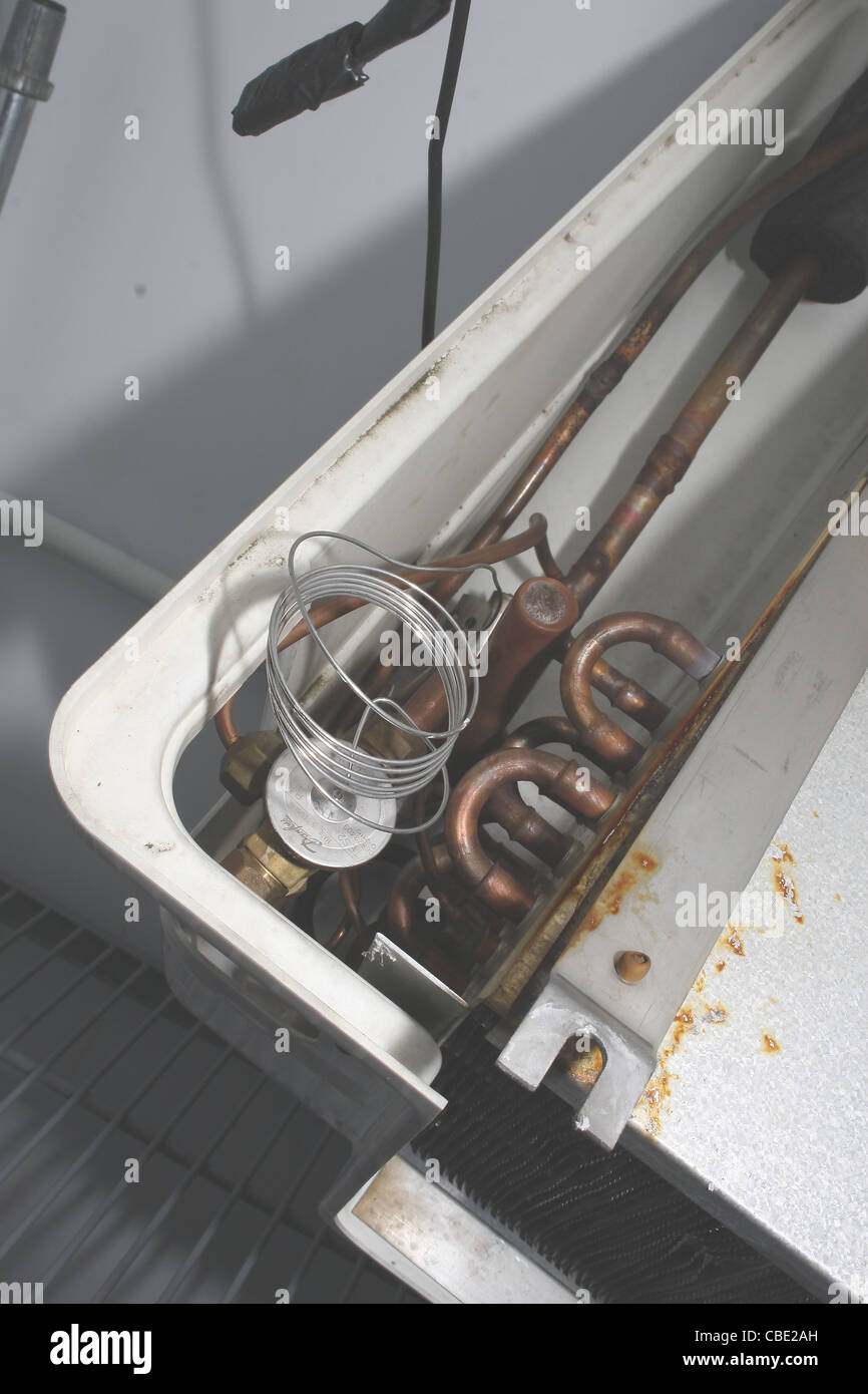 close up image of broken compressor in freezer Stock Photo