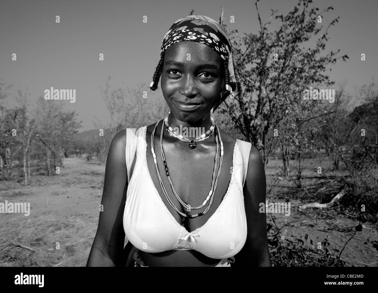 Celebration on a wedding day in the village of Combelo. Woman wearing a bra because she has been evangelized. Stock Photo