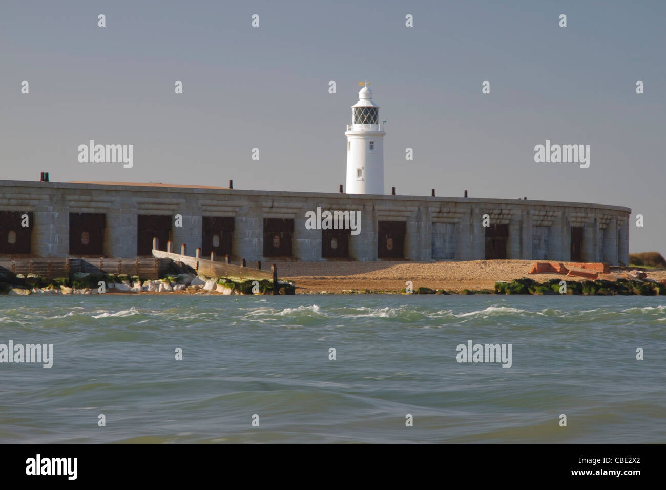 Hurst Castle and lighthouse, Hurst Point on the Hampshire coast, viewed from the sea Stock Photo