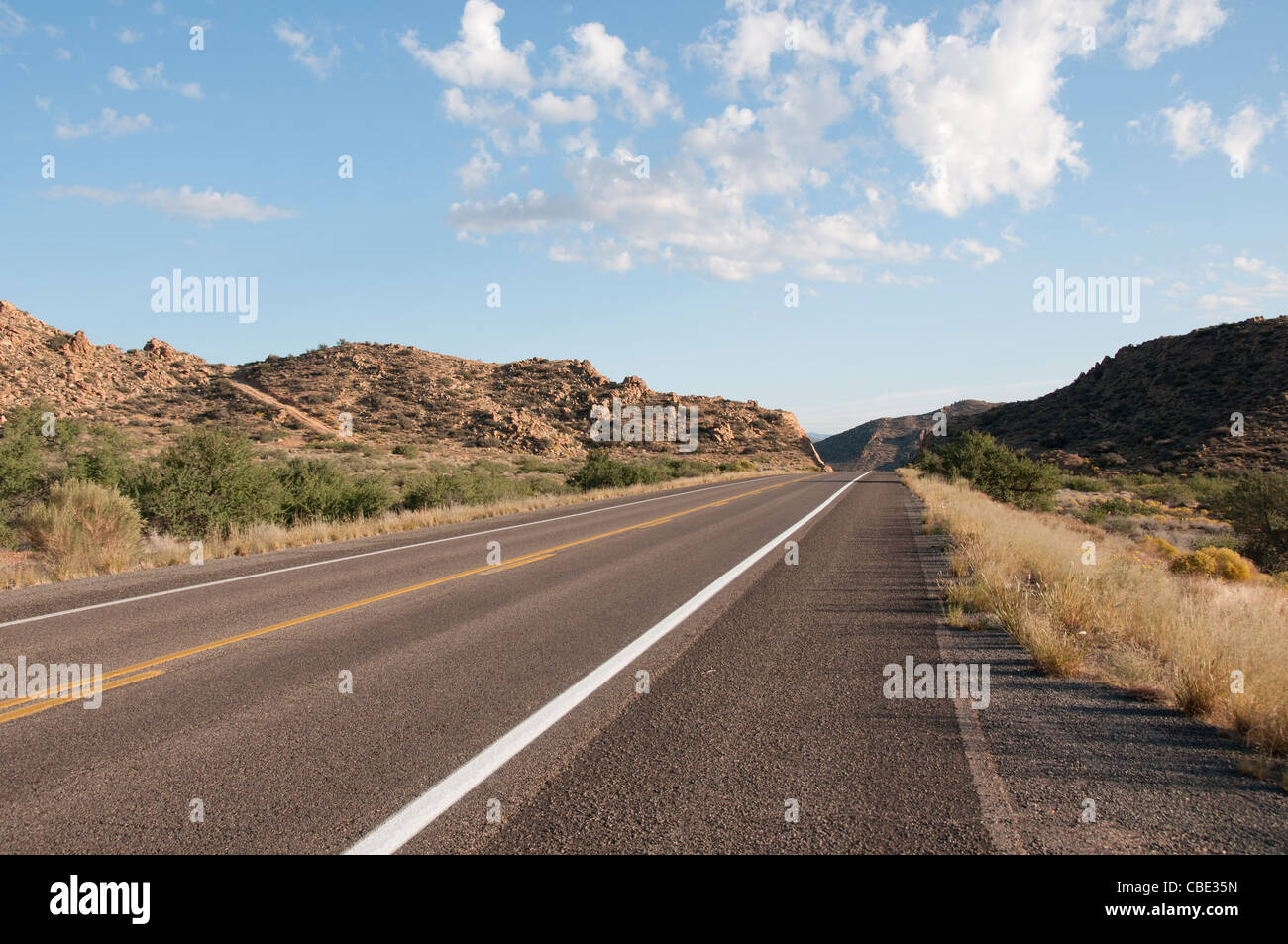 Scenic empty bending mountain road in the hills of Arizona United States Stock Photo
