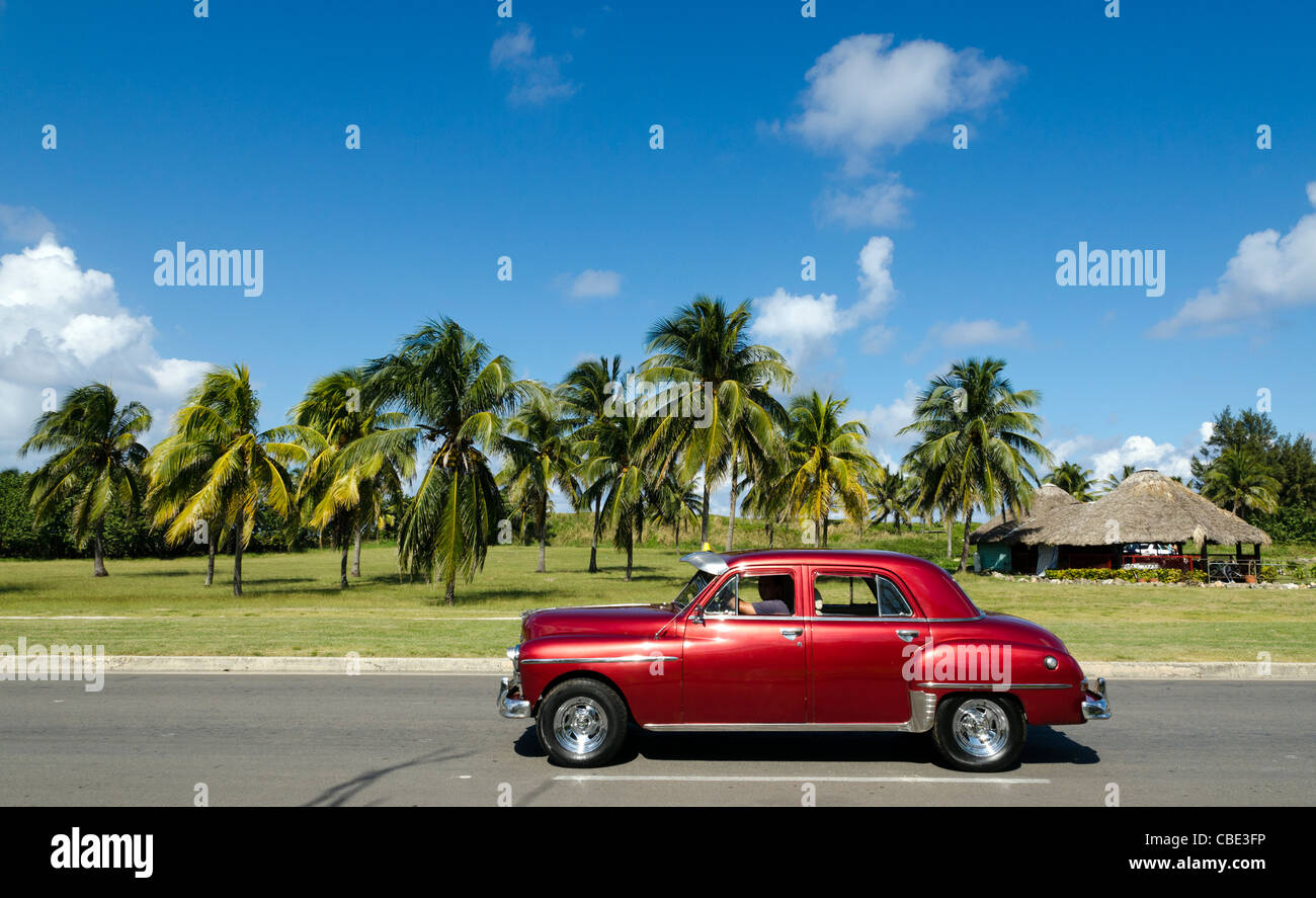Old American car driving Santa Maria del Mar Havana Cuba Stock Photo