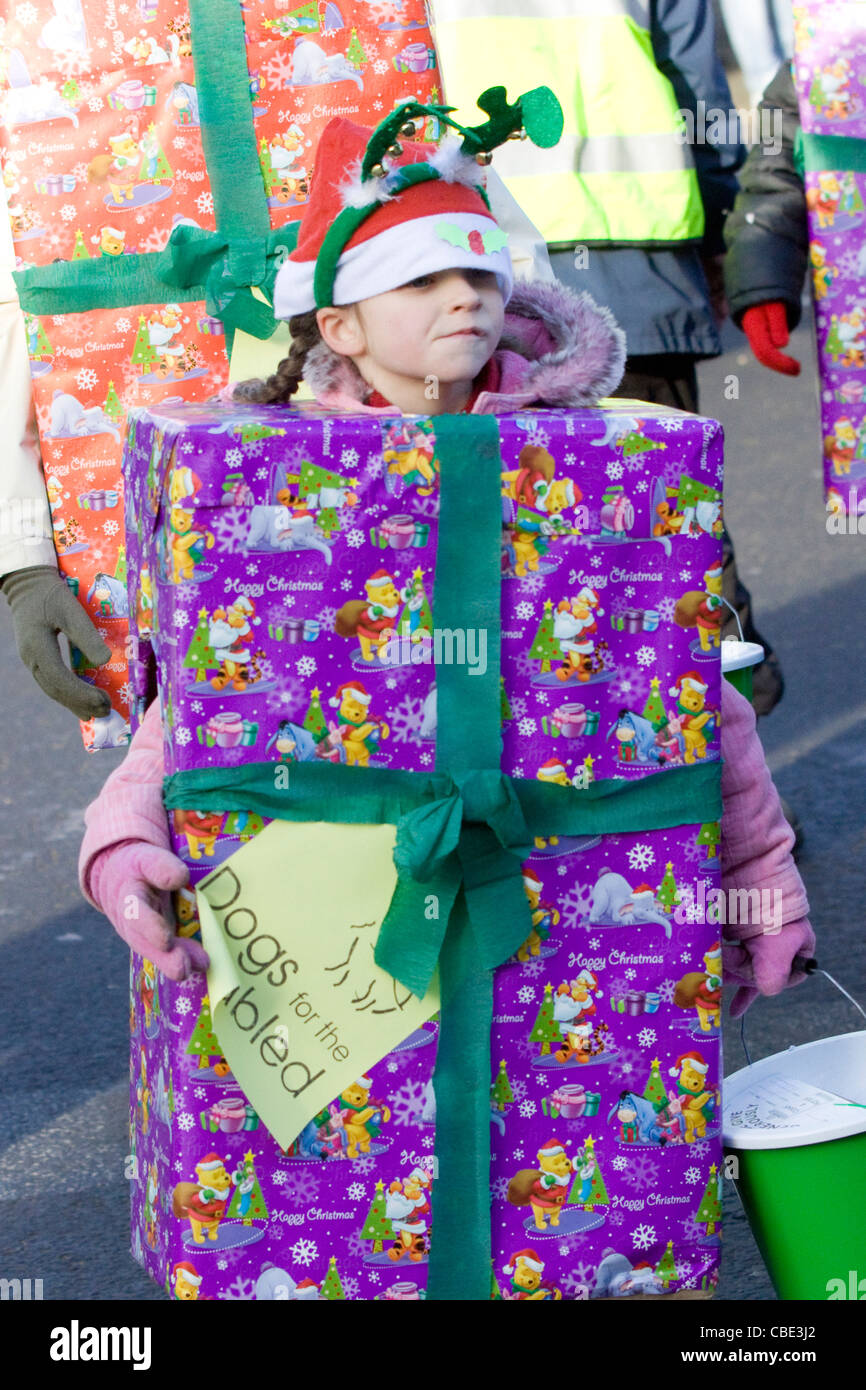 Child Dressed up as a Christmas Present for the Disney Christmas Parade