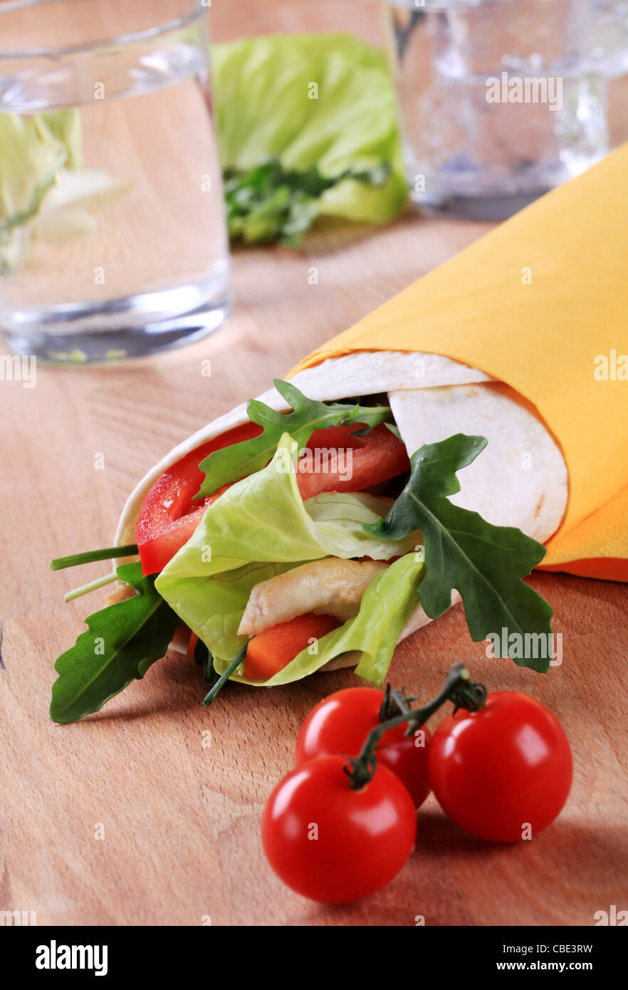 Wrap sandwich with chicken meat and vegetables Stock Photo Alamy