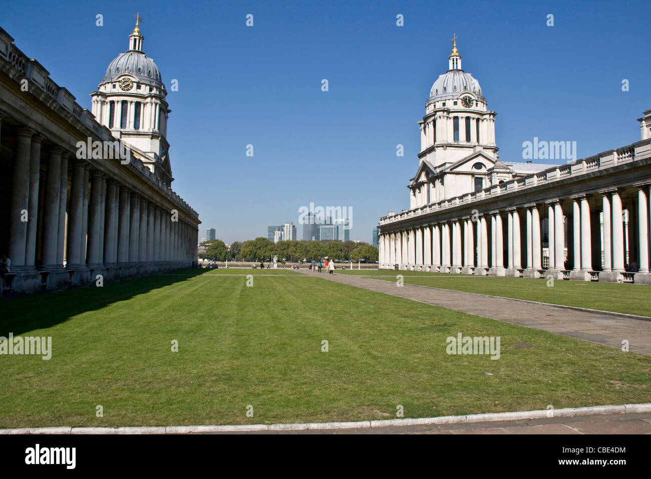 Grade 1 listed Old Royal Naval College UNESCO world heritage site with Canary Wharf in background Greenwich London England Stock Photo