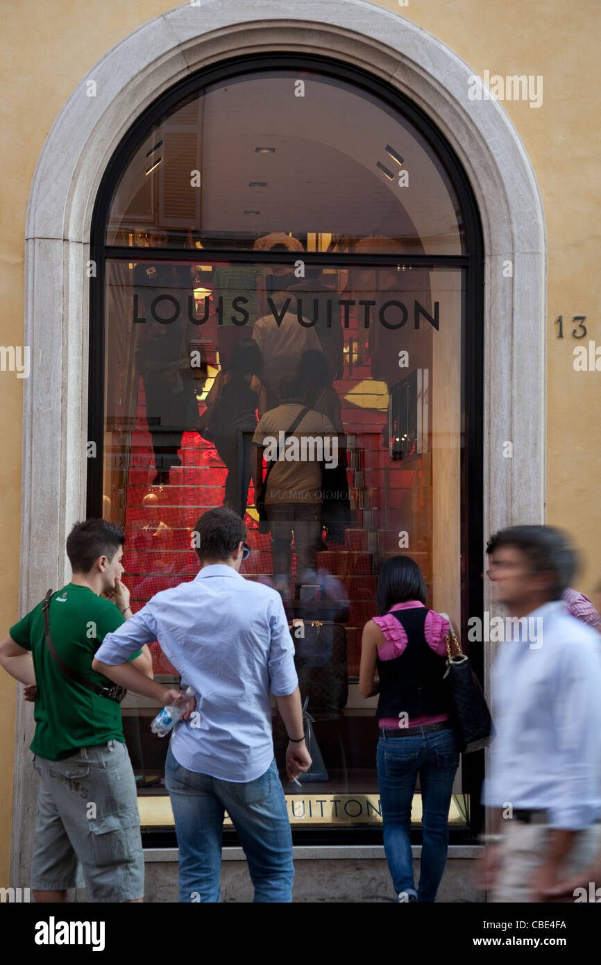 Louis Vuitton via dei Condotti fashion shop shopping Rome street store shop  window entrance fashion accessories Stock Photo - Alamy