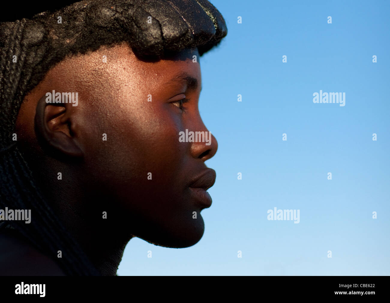 Mucawana With Traditional Hairstyle, Village Of Oncocua, Angola Stock Photo