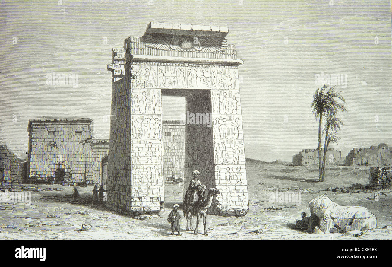 Ruins of Karnak or El-Karnakn, Monumental Gate of Karnak Temple, northern half of ancient Thebes, Ancient Egypt. 1860 Engraving or Vintage Illustration Stock Photo