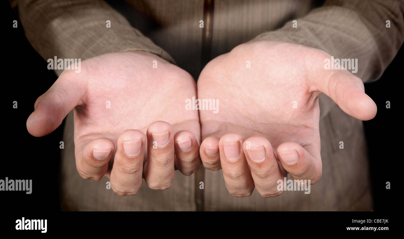 human hands on a dark background Stock Photo
