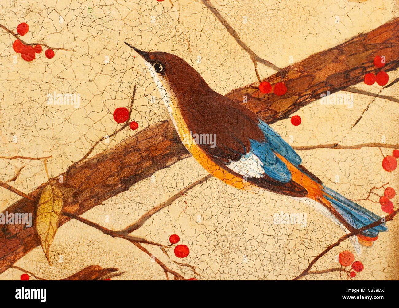 Painting. Colorful bird on branches with red berries Stock Photo