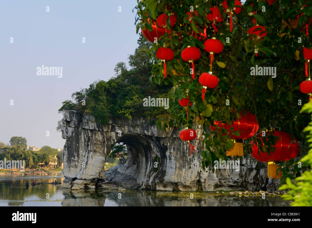 Red National Day lanterns in tree with Water Moon Cave of Elephant Trunk Hill Park on Li River Guilin China Stock Photo