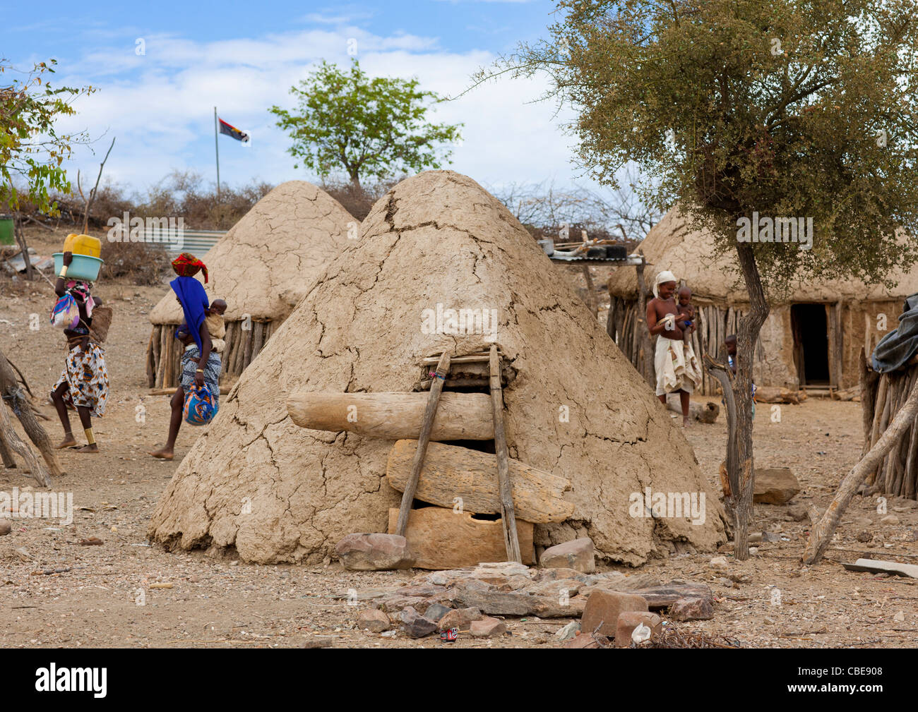 Huts In Mud In A Mucubal Village, Virie Area, Angola Stock Photo